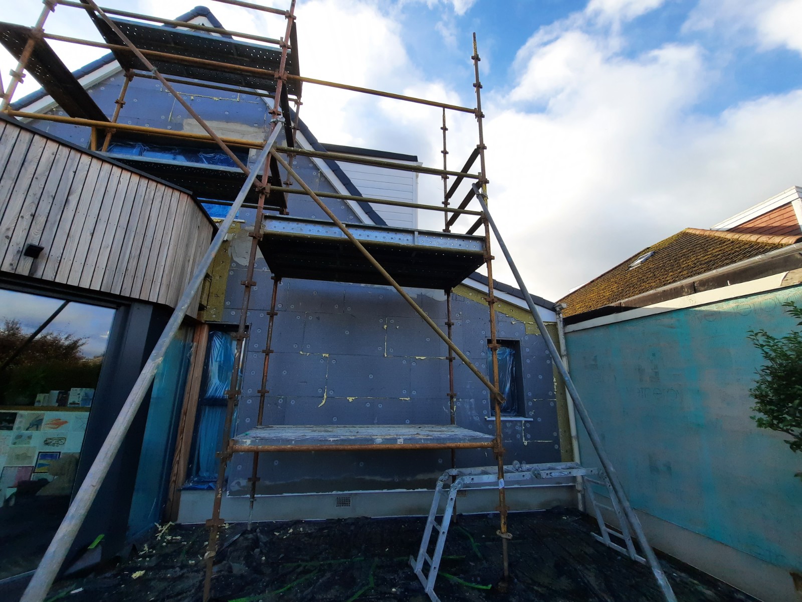 Insulation Edinburgh installed on corner elevation under scaffolding