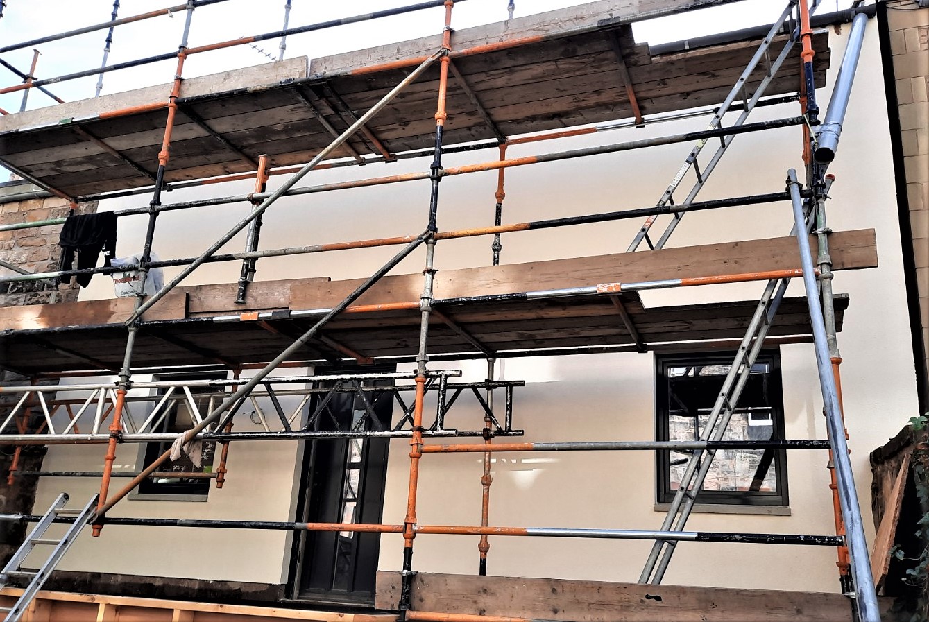 roughcaster Edinburgh fixing external wall insulation panels