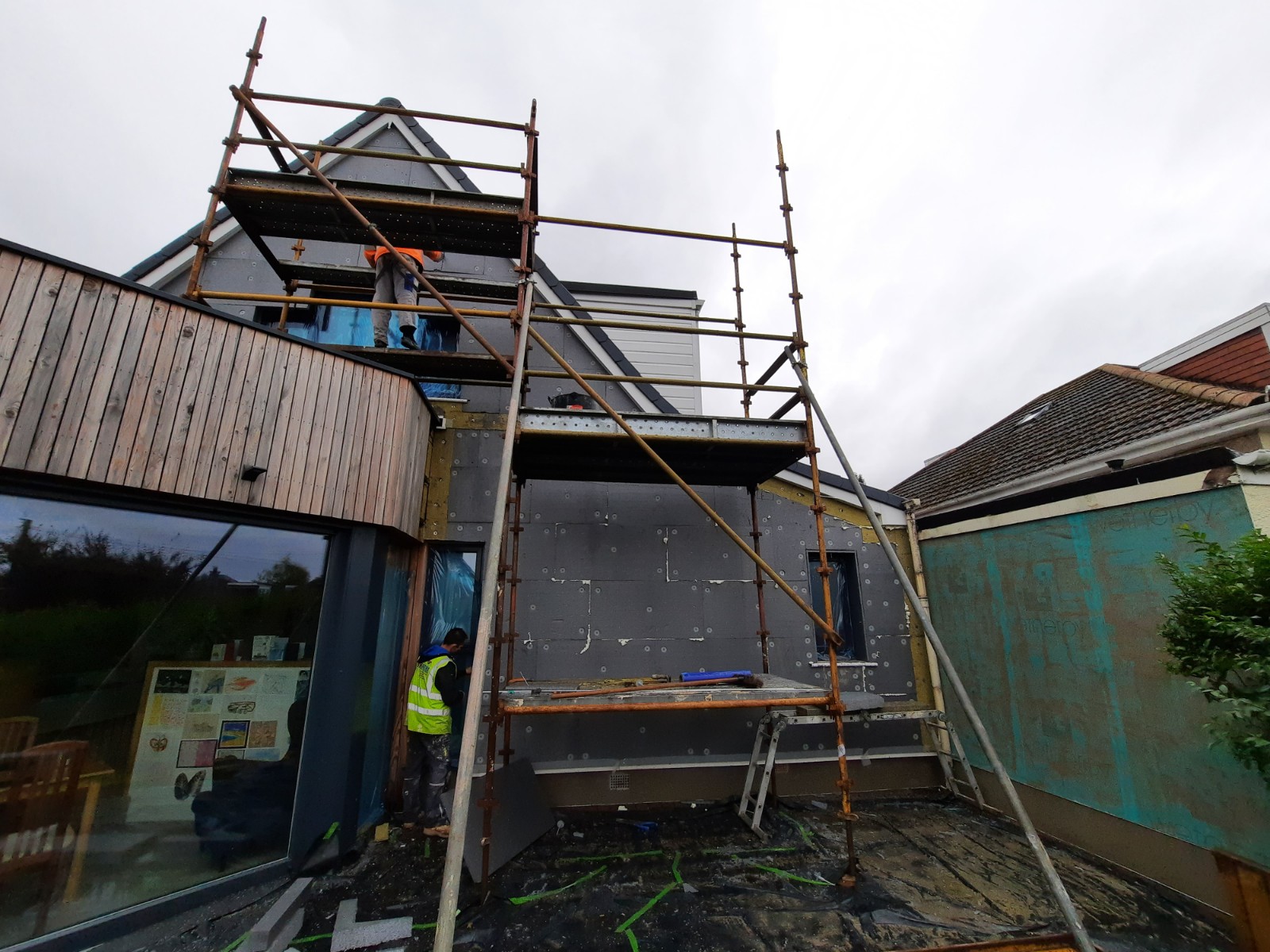 roughcast render repair on rear elevation with scaffolding