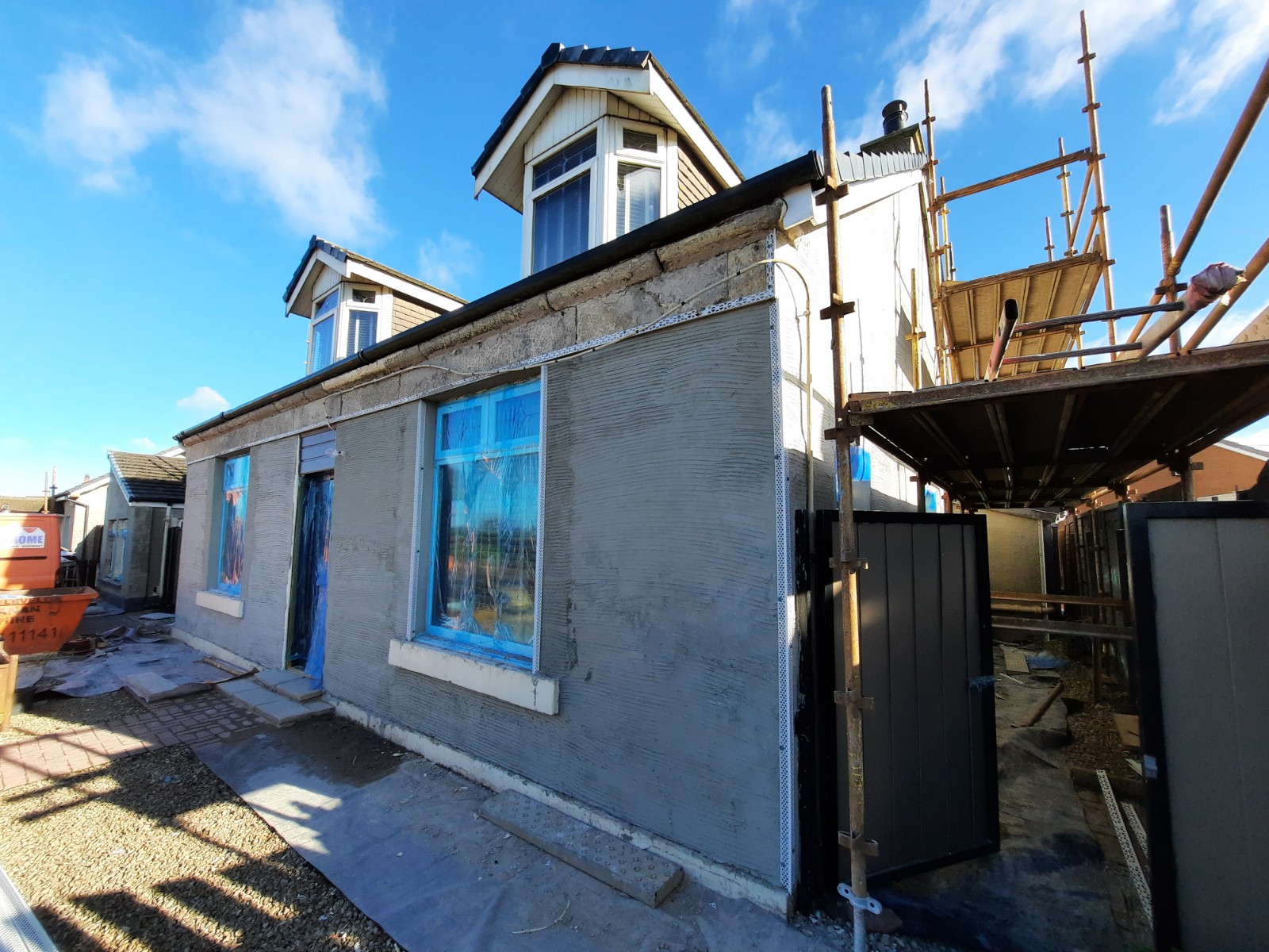 side elevation freshly covered with solid wall insulation Edinburgh