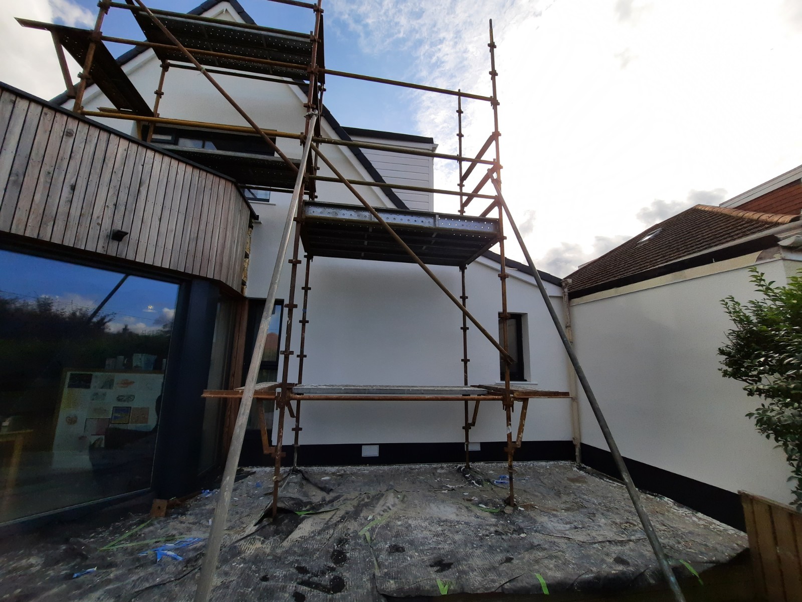 Insulation Edinburgh beneath render on high side wall