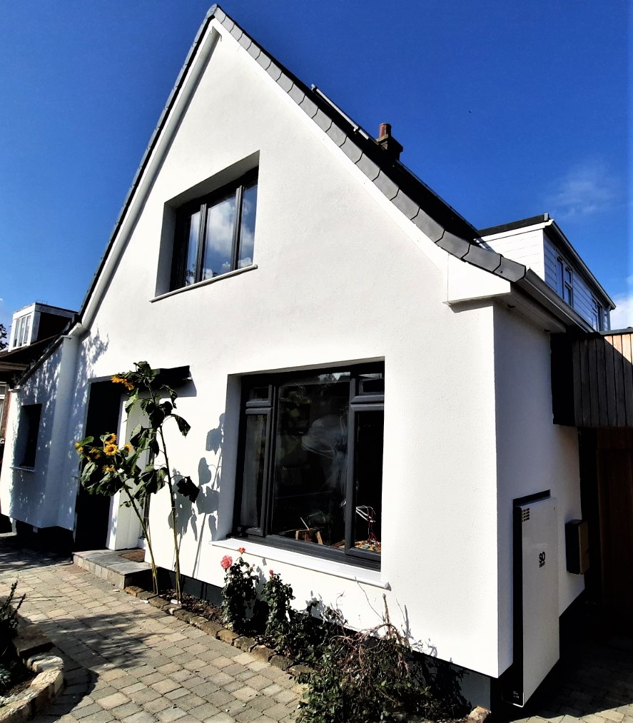 roughcast render Edinburgh on modern gable house with garden