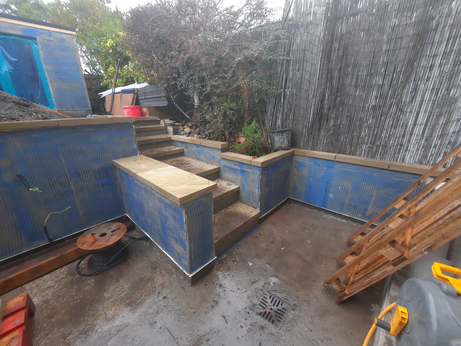 garden steps area under roughcast render repair