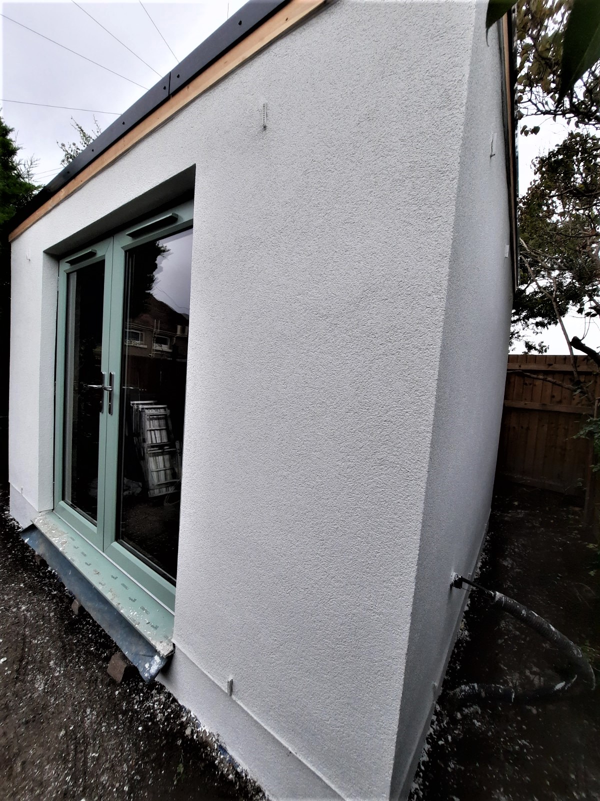 side angle view with fresh roughcast render Edinburgh