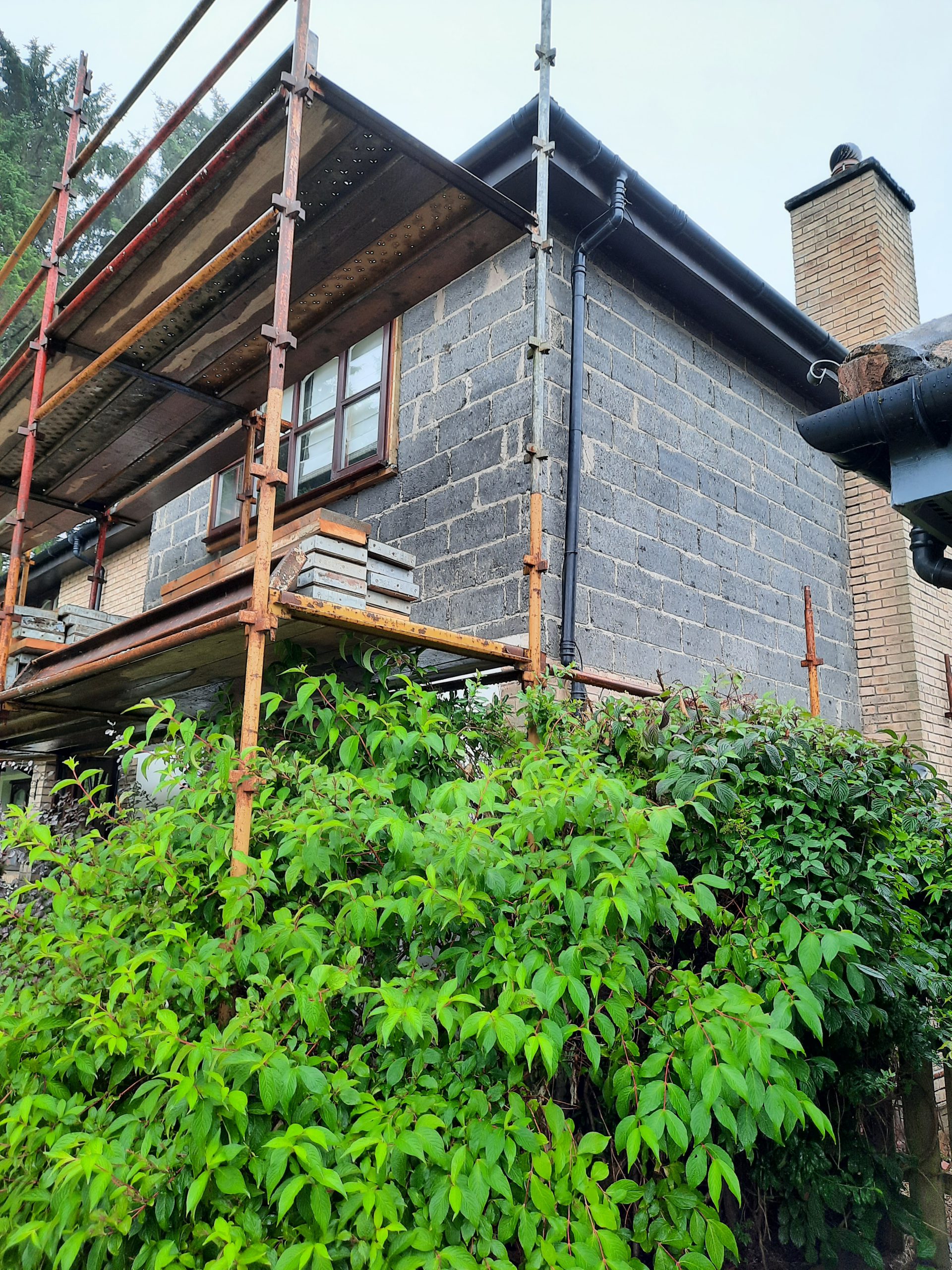 side view with ongoing house rendering Edinburgh work