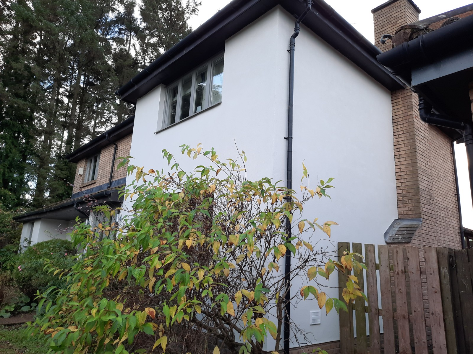 side view of house with smooth roughcast render Edinburgh