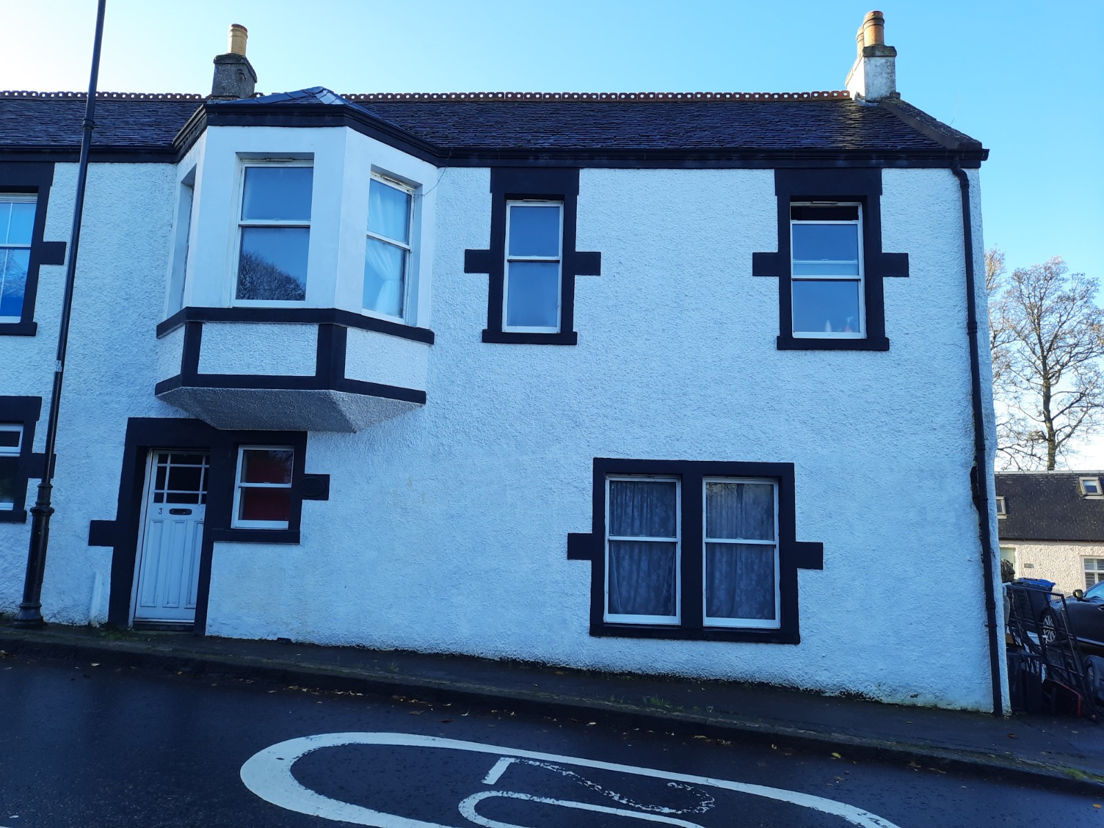 front elevation with black trim after roughcast render Edinburgh
