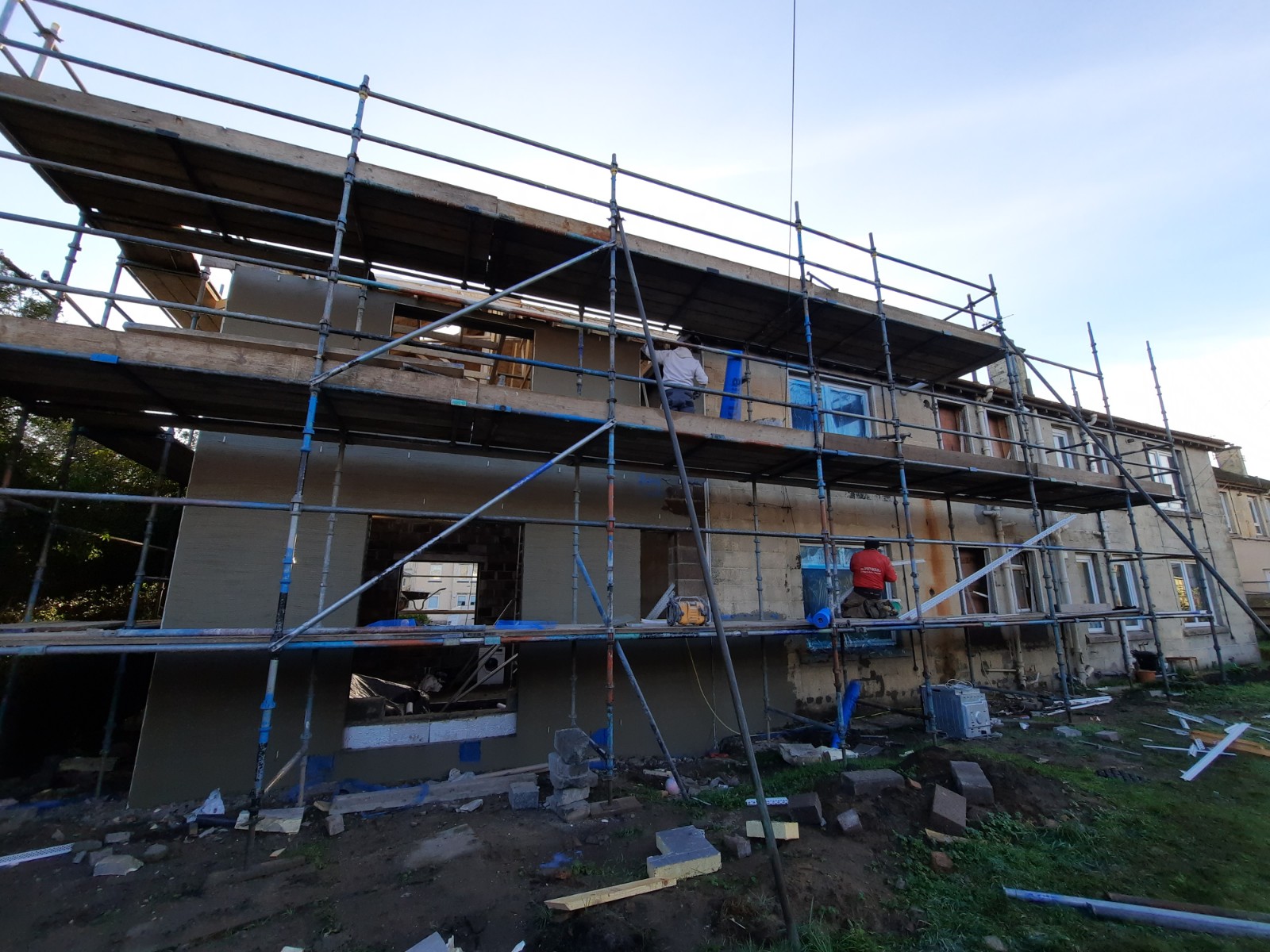long row of houses under roughcasting Edinburgh work