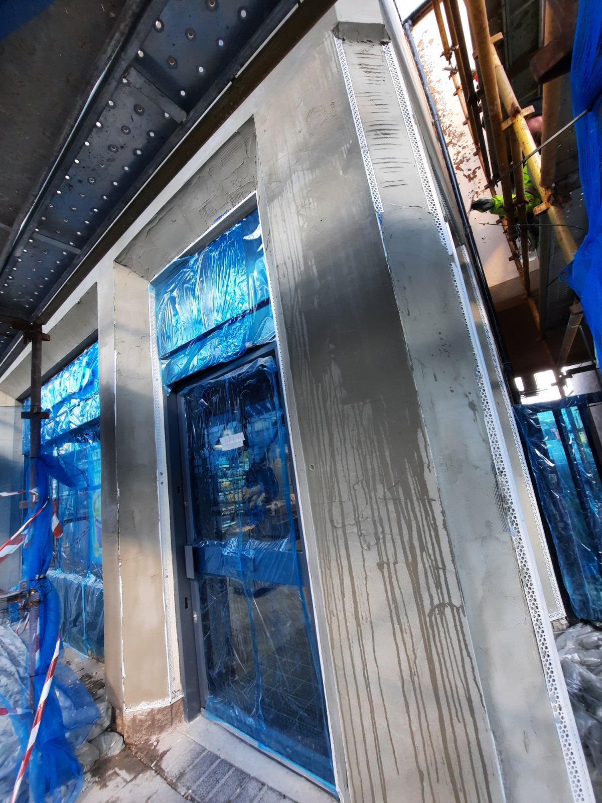door frame area under roughcast repair