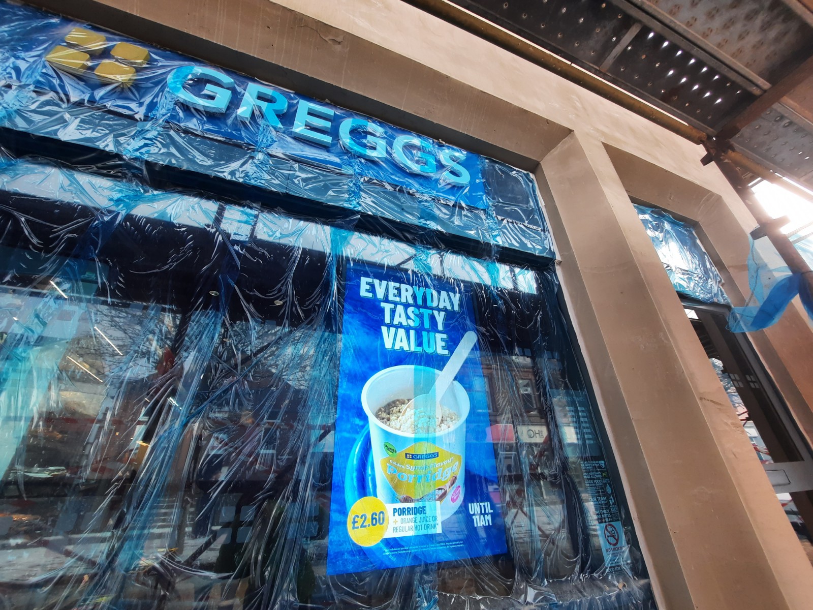 shop window during external wall insulation Edinburgh