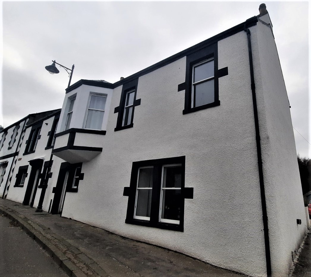 row of windows on white house with house rendering Edinburgh