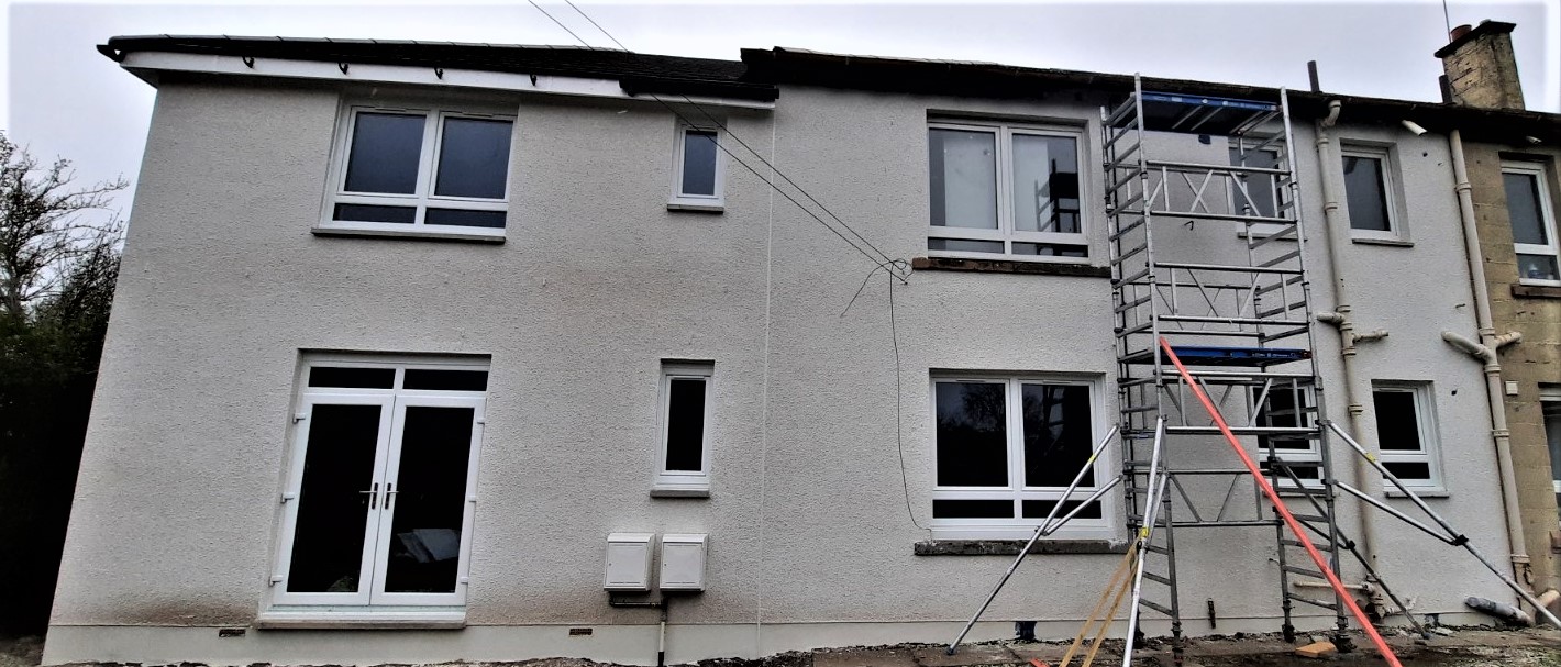 rear view of property with roughcast render Edinburgh