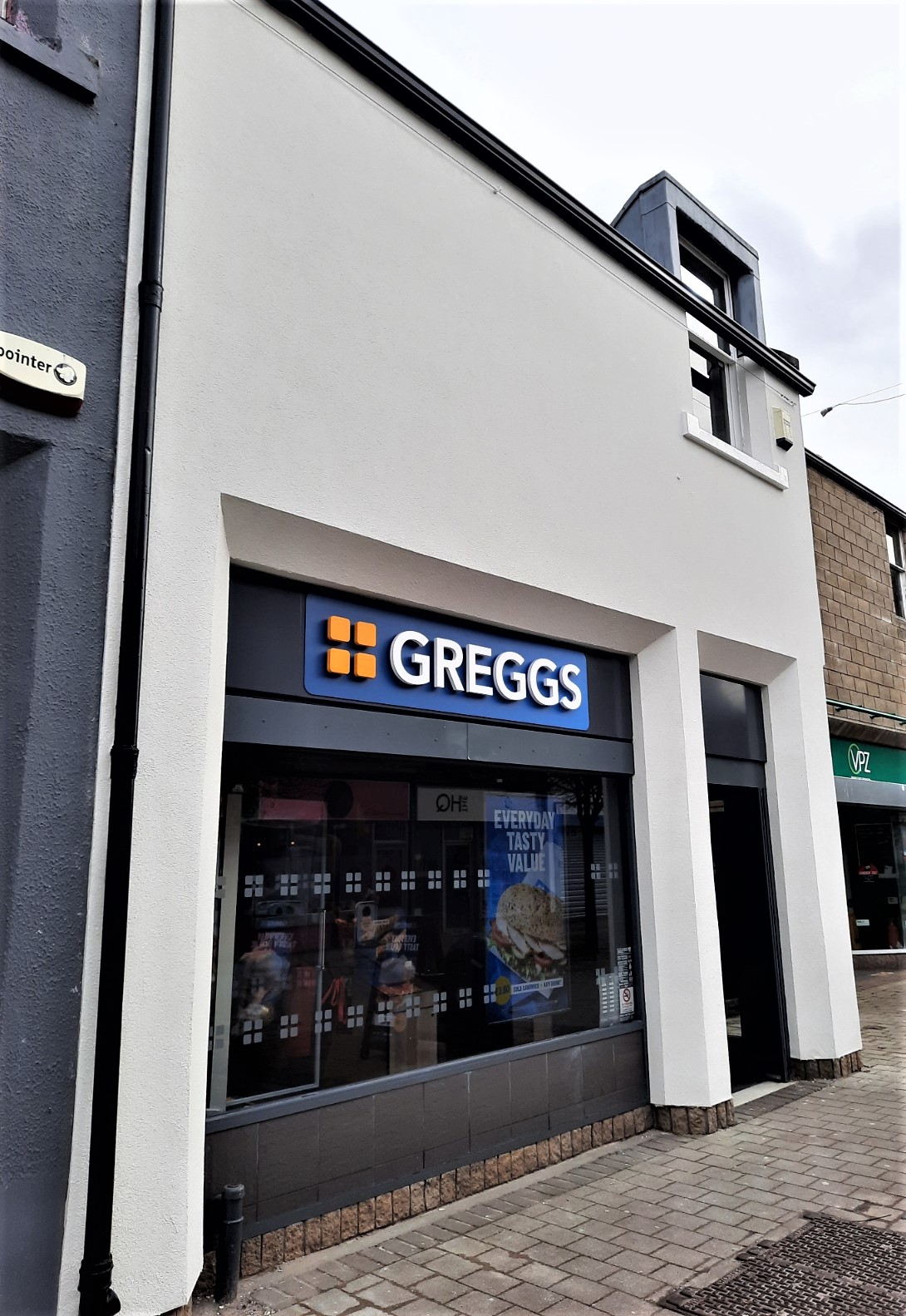 shopfront close-up showing roughcaster Edinburgh work