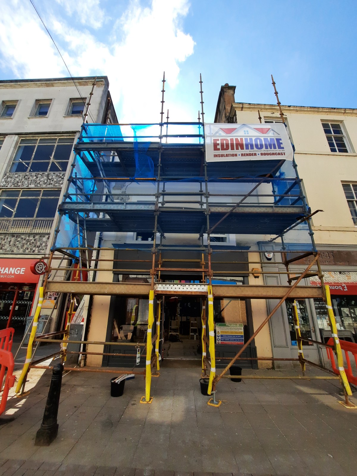 front view shop renovation with roughcast render Edinburgh