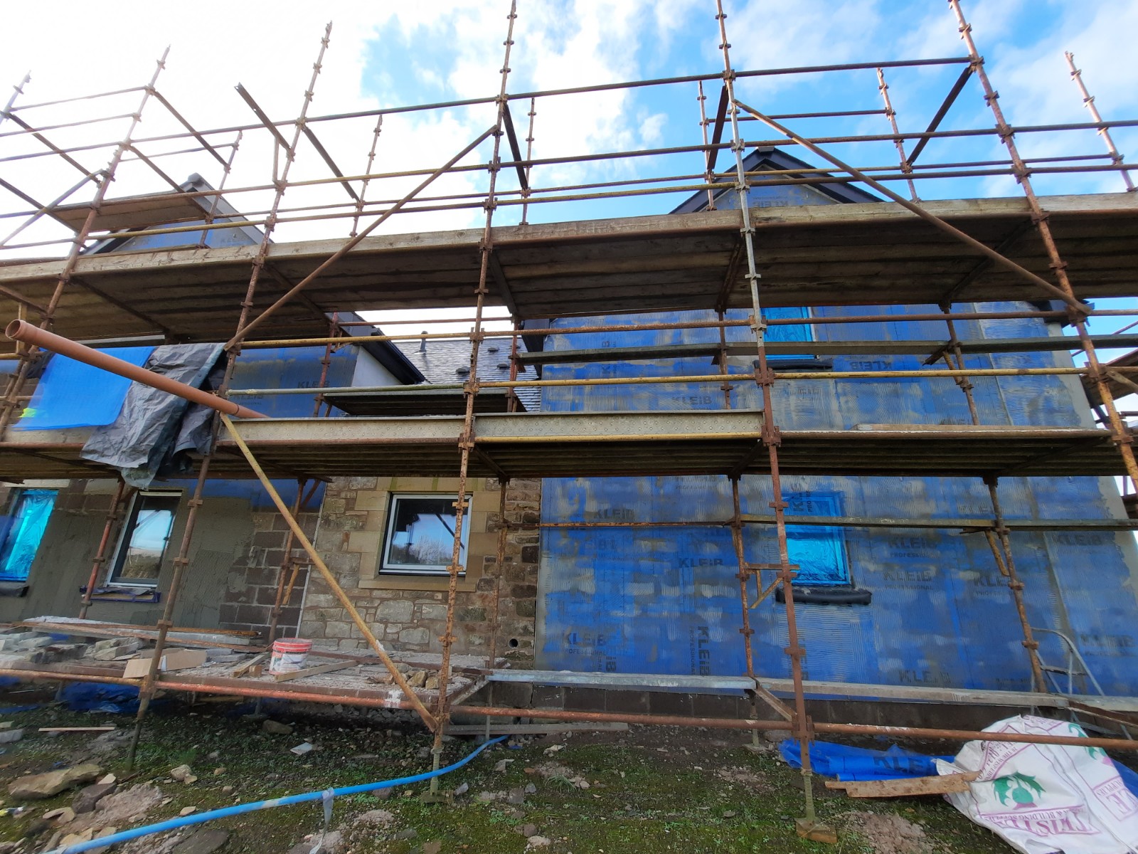 partial facade with roughcast render Edinburgh finish