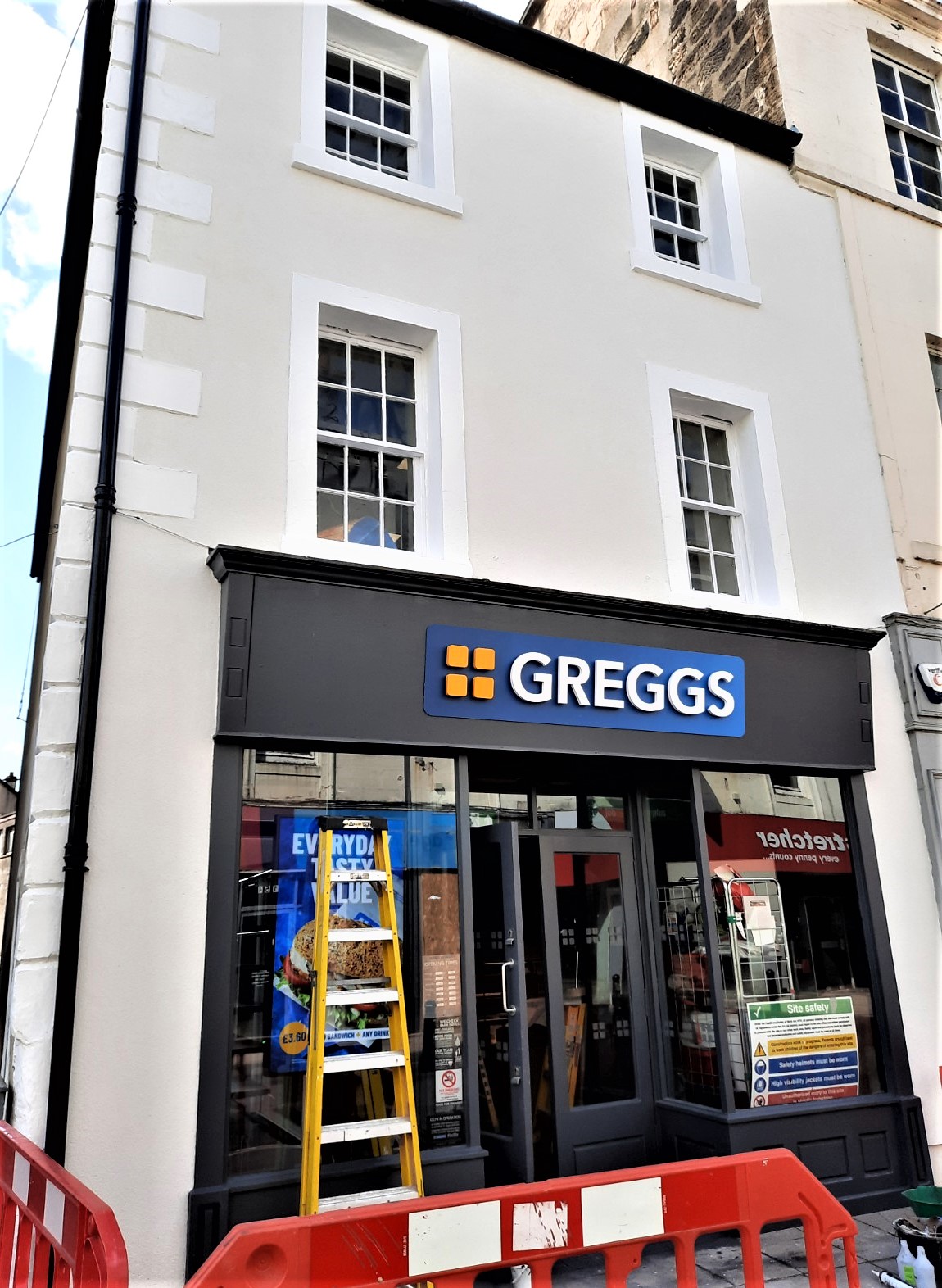 another shopfront angle with roughcaster Edinburgh