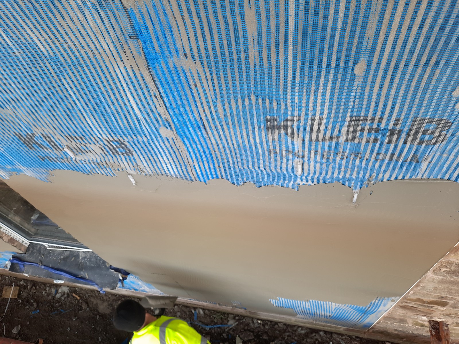 close-up view of solid wall insulation Edinburgh in progress