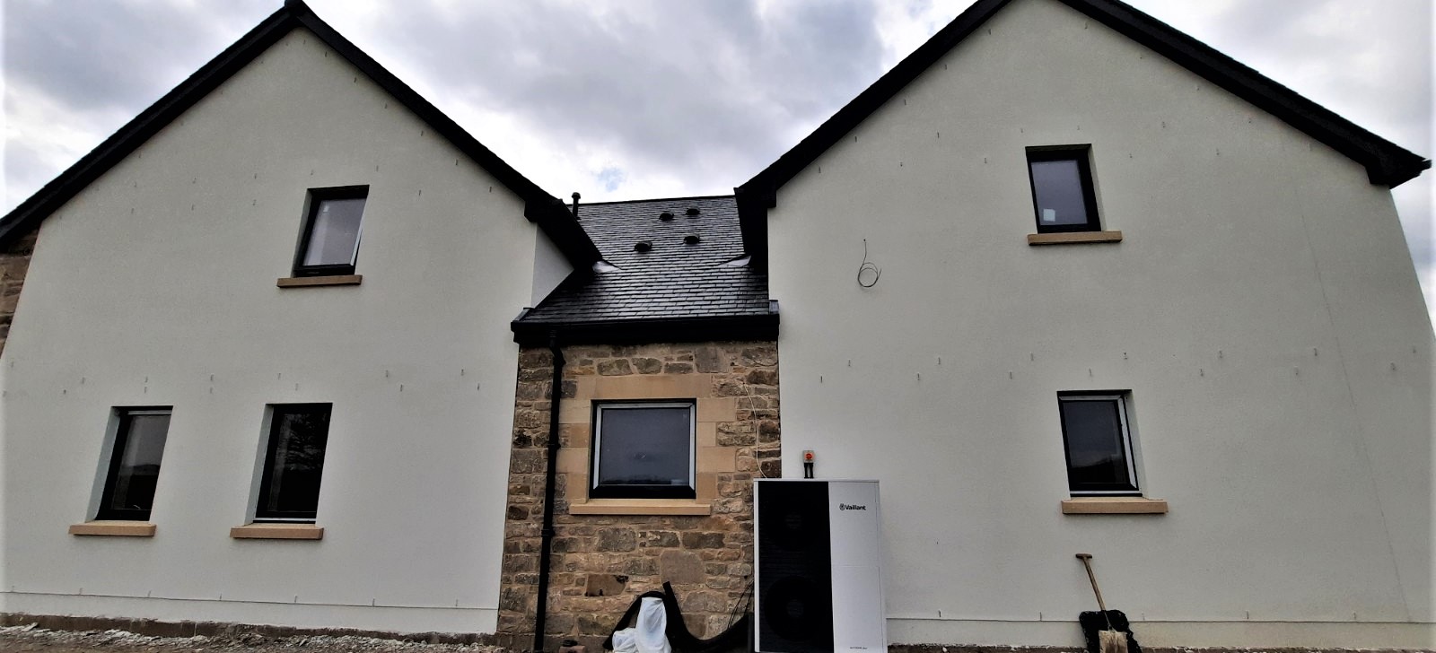 mixed stone and render with solid wall insulation Edinburgh
