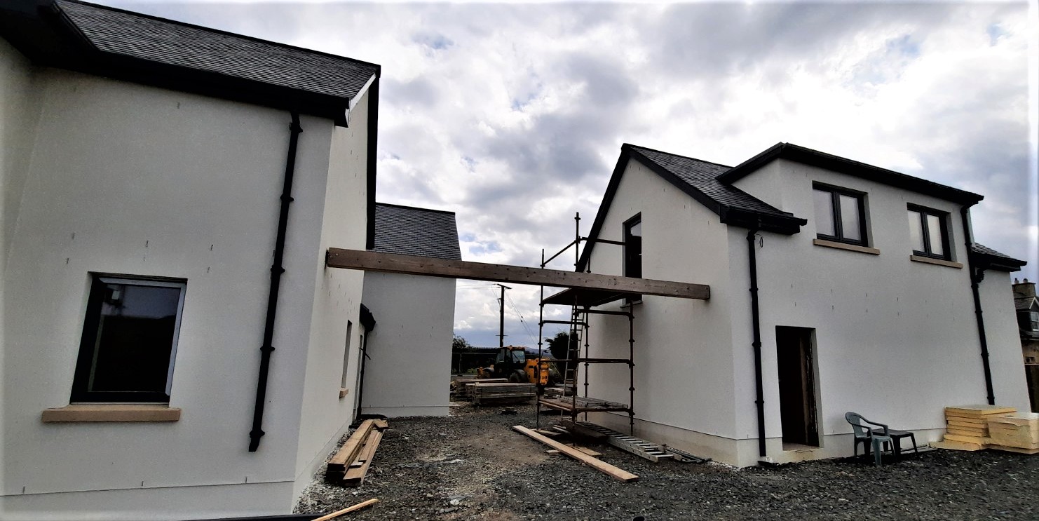 new build with white exterior and roughcasting Edinburgh