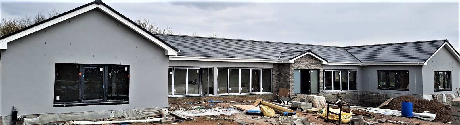 rear facade with patio doors and roughcast render Edinburgh
