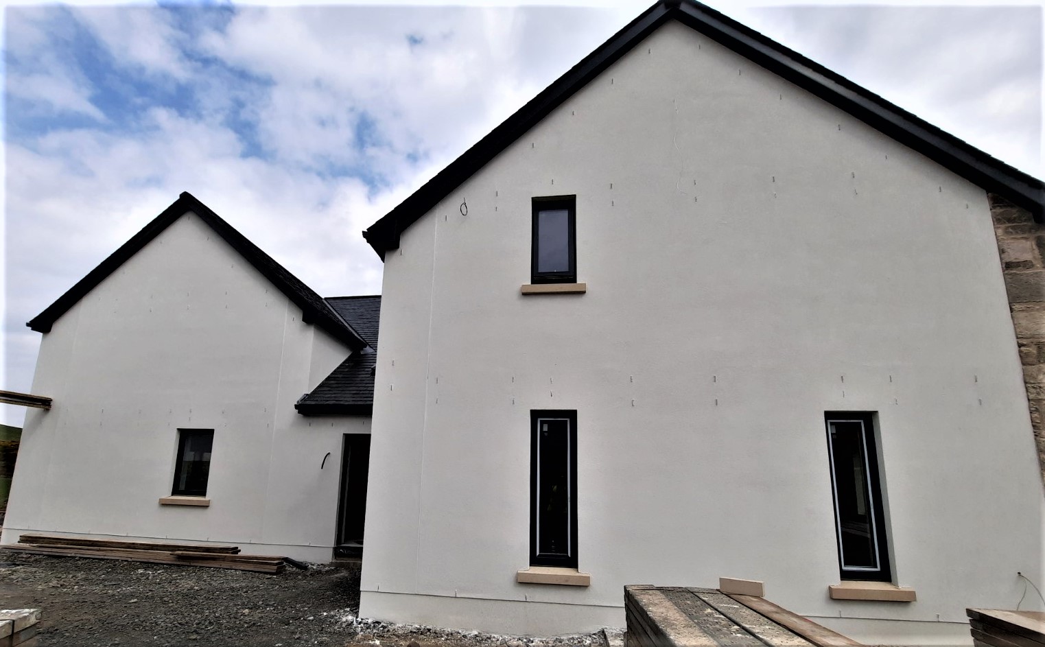 tall narrow window with house rendering Edinburgh
