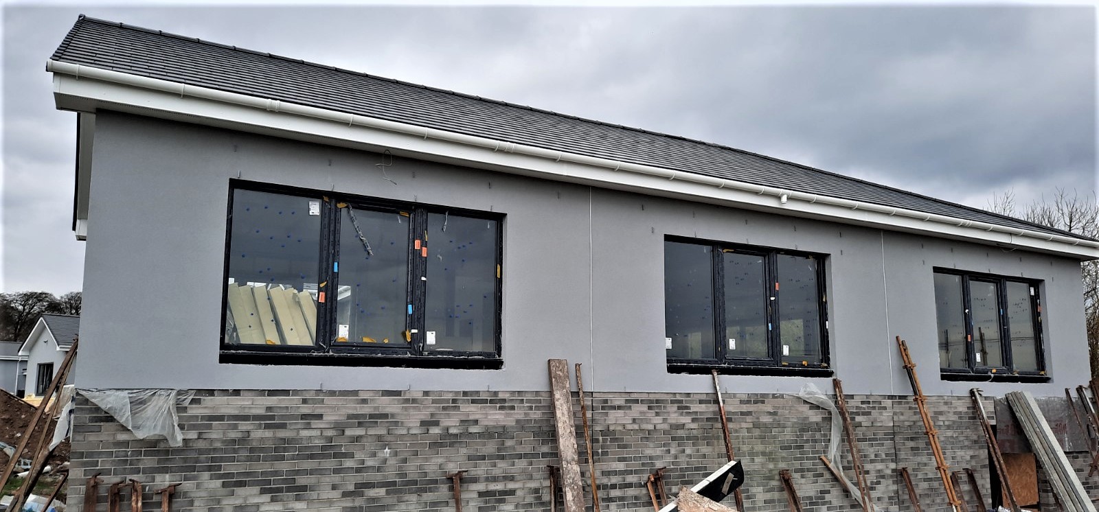 gable end featuring fresh roughcasting Edinburgh