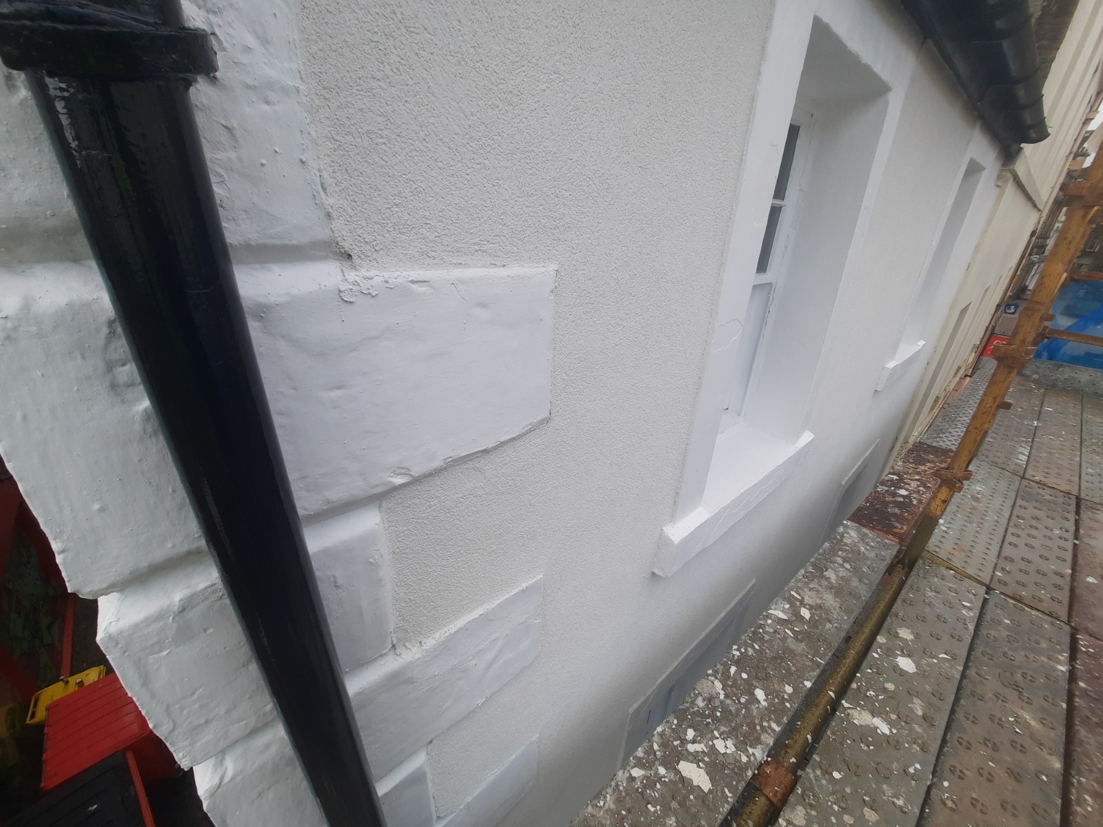 close-up of neat roughcast render repair