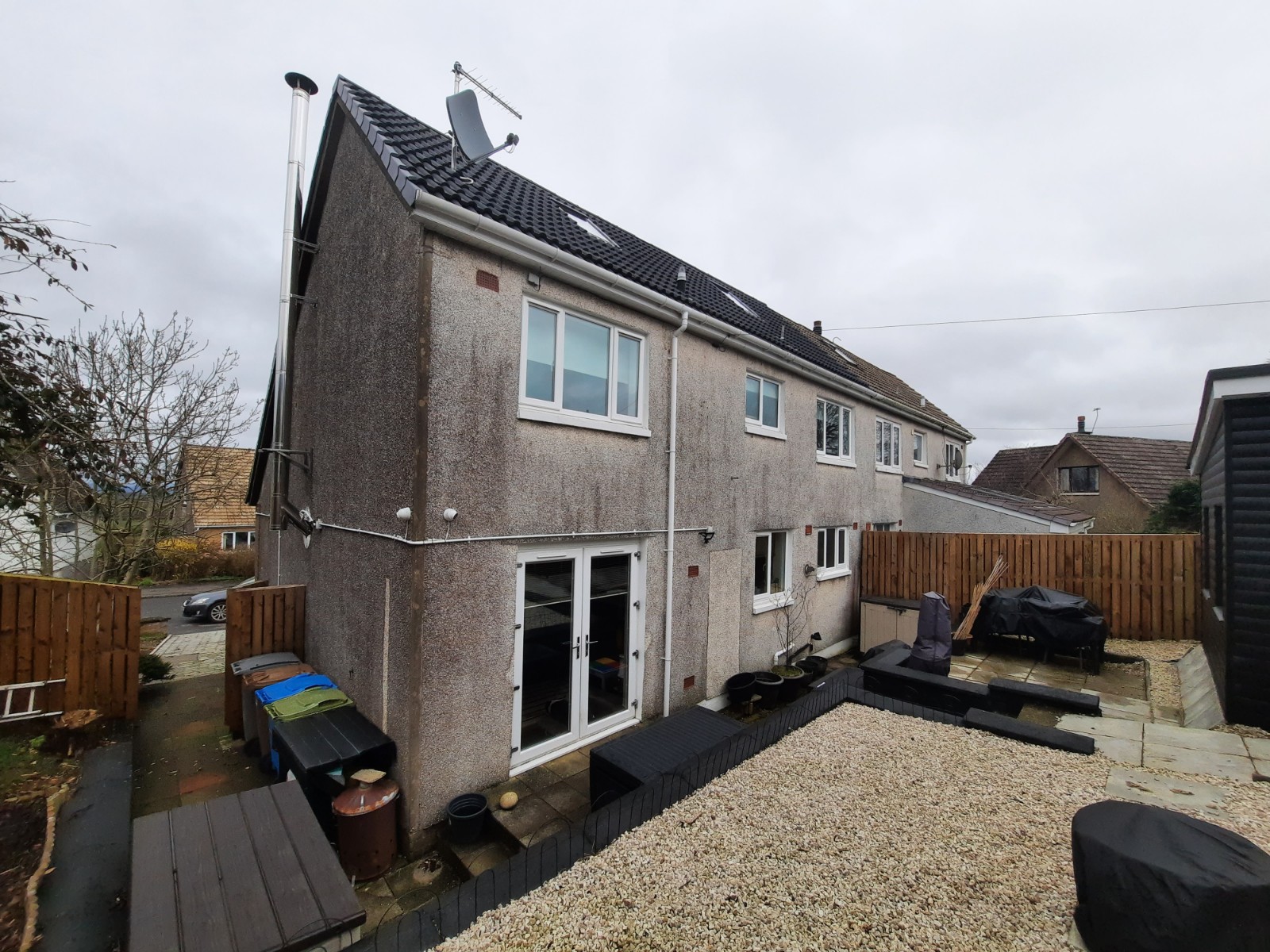 garden view roughcast repair on side wall