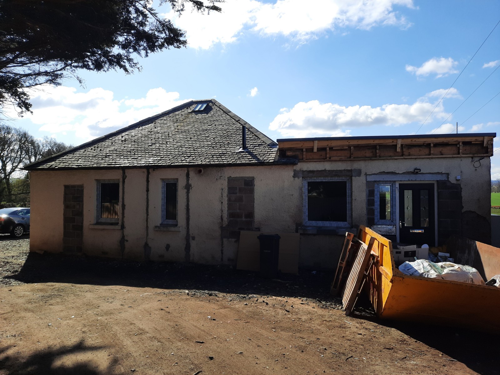 roughcaster Edinburgh preparing rear bungalow wall for rendering