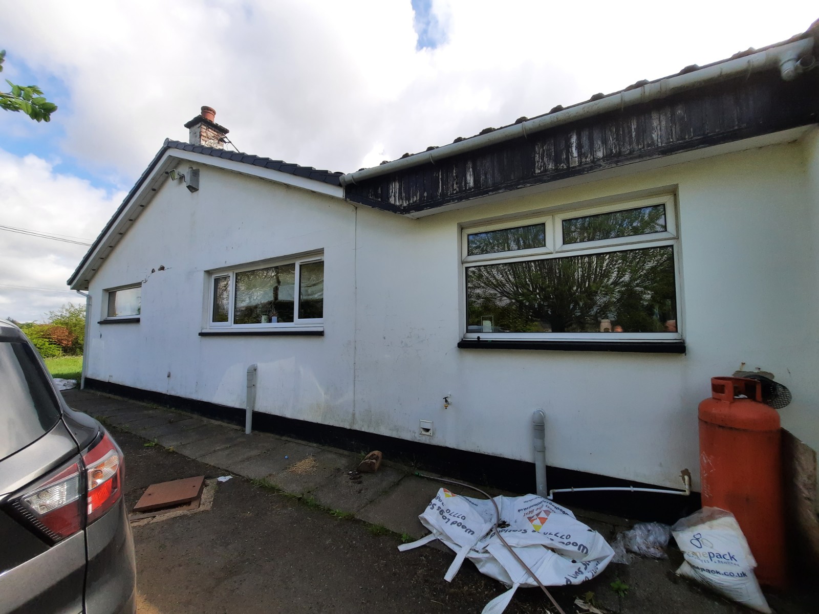 Insulation Edinburgh beneath white render on side extension
