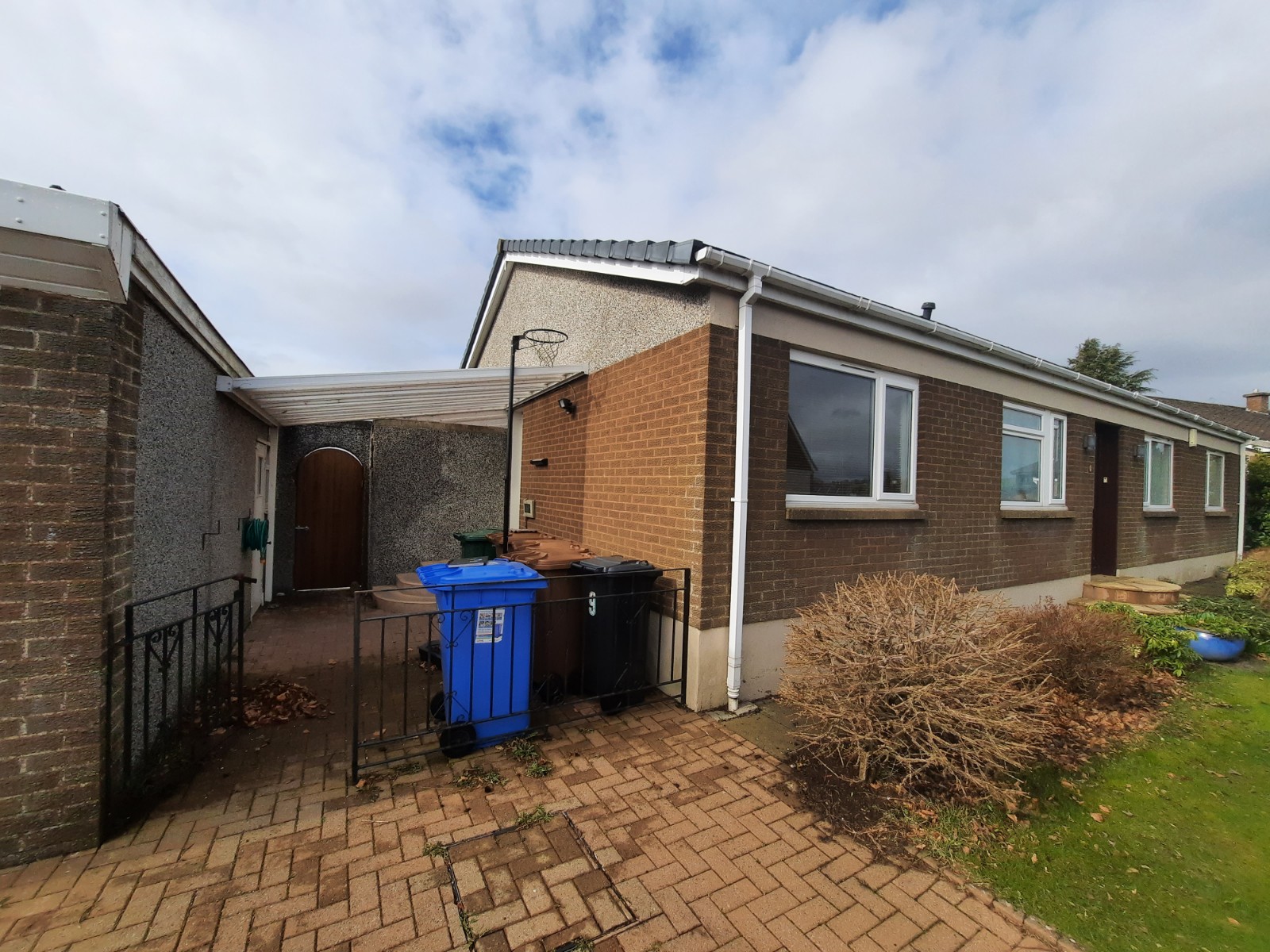 roughcast render repair on mixed brick and render rear elevation