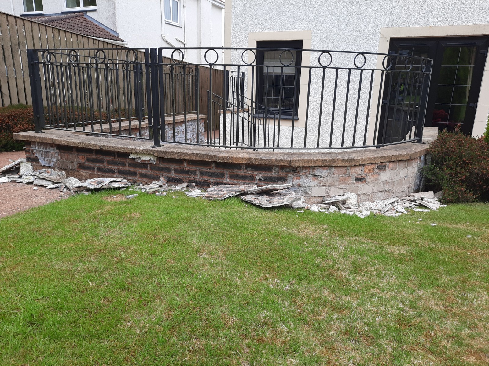 roughcast render repair after removal of old coating around garden patio