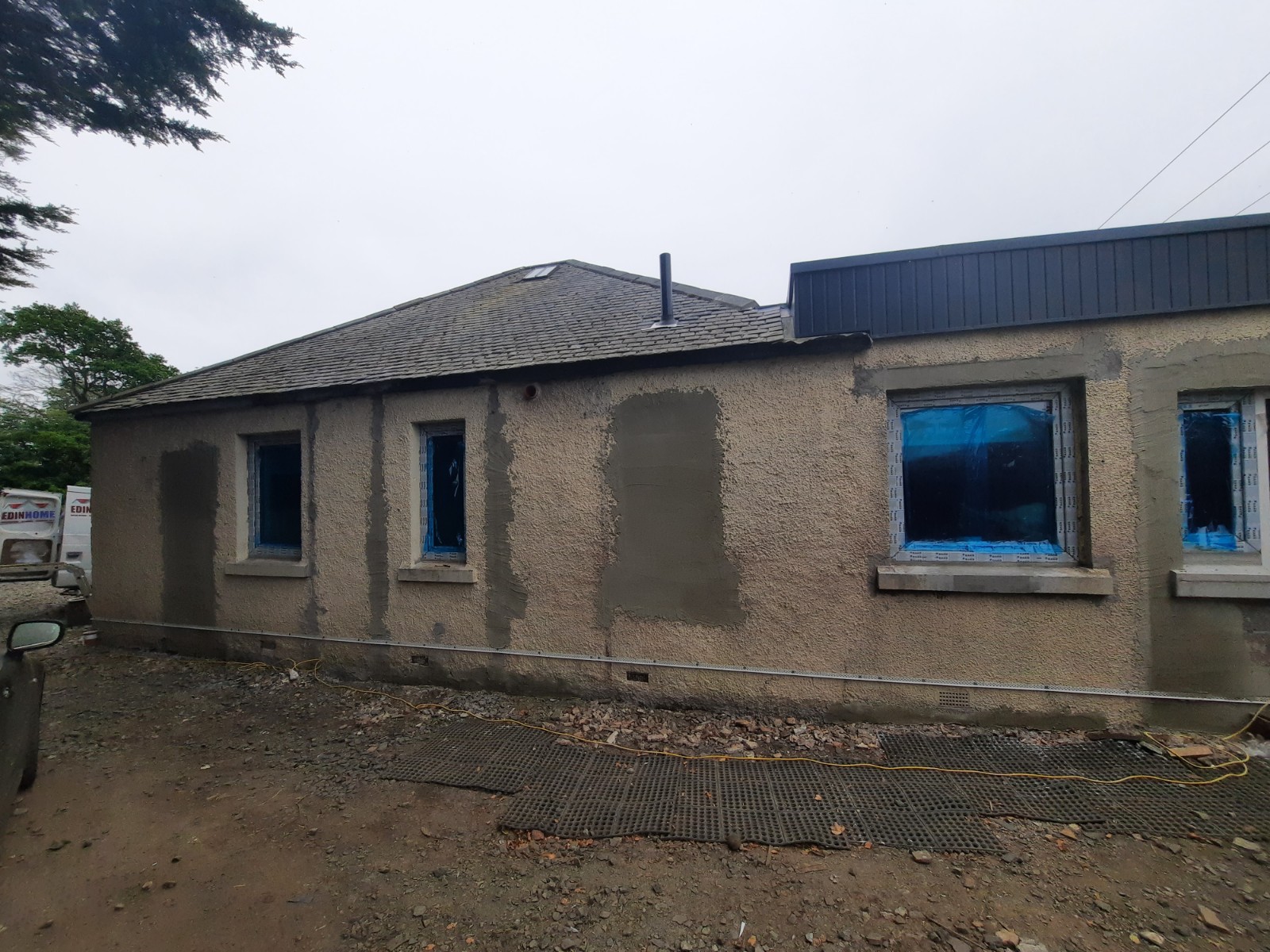 Rendering Edinburgh on single-storey home during renovation