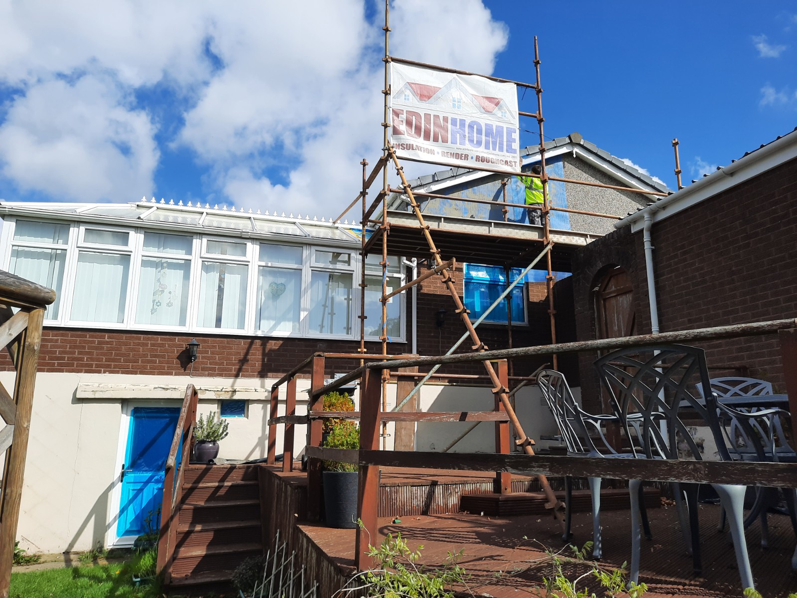 roughcast repair under scaffolding at back garden wall