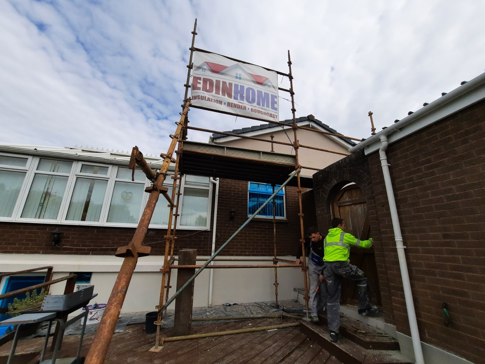 external wall insulation Edinburgh on wall with protective sheet