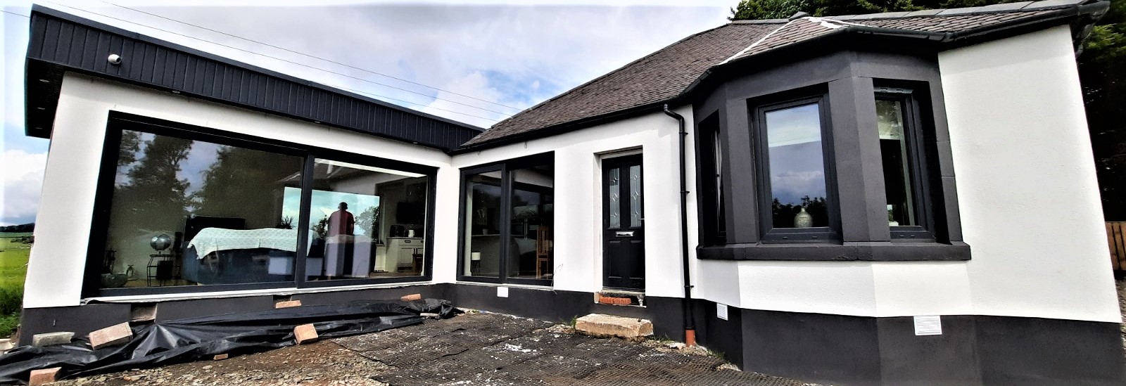 Insulation Edinburgh beneath smooth white render on rear exterior