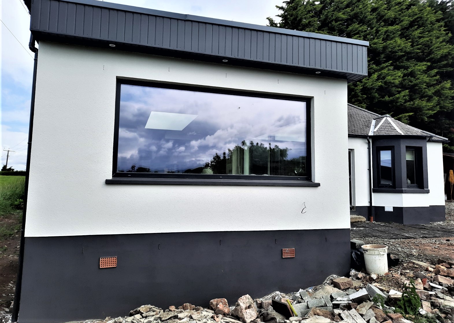 Rendering Edinburgh on corner wall with large window view