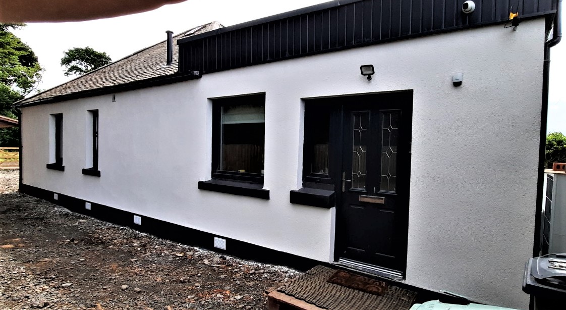 roughcaster Edinburgh working on rear exterior with black door finish