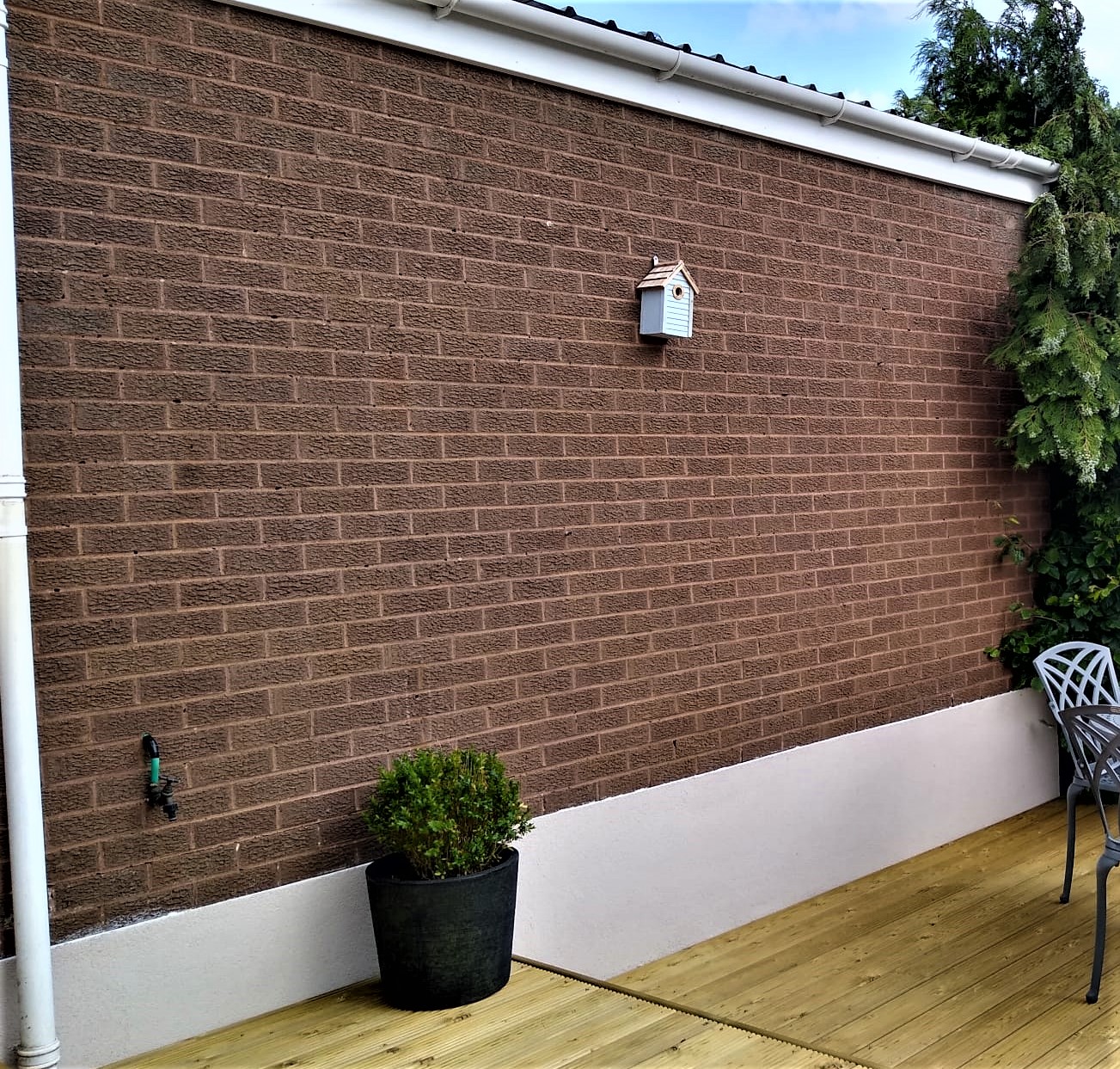 external wall insulation Edinburgh on brick wall with white base render