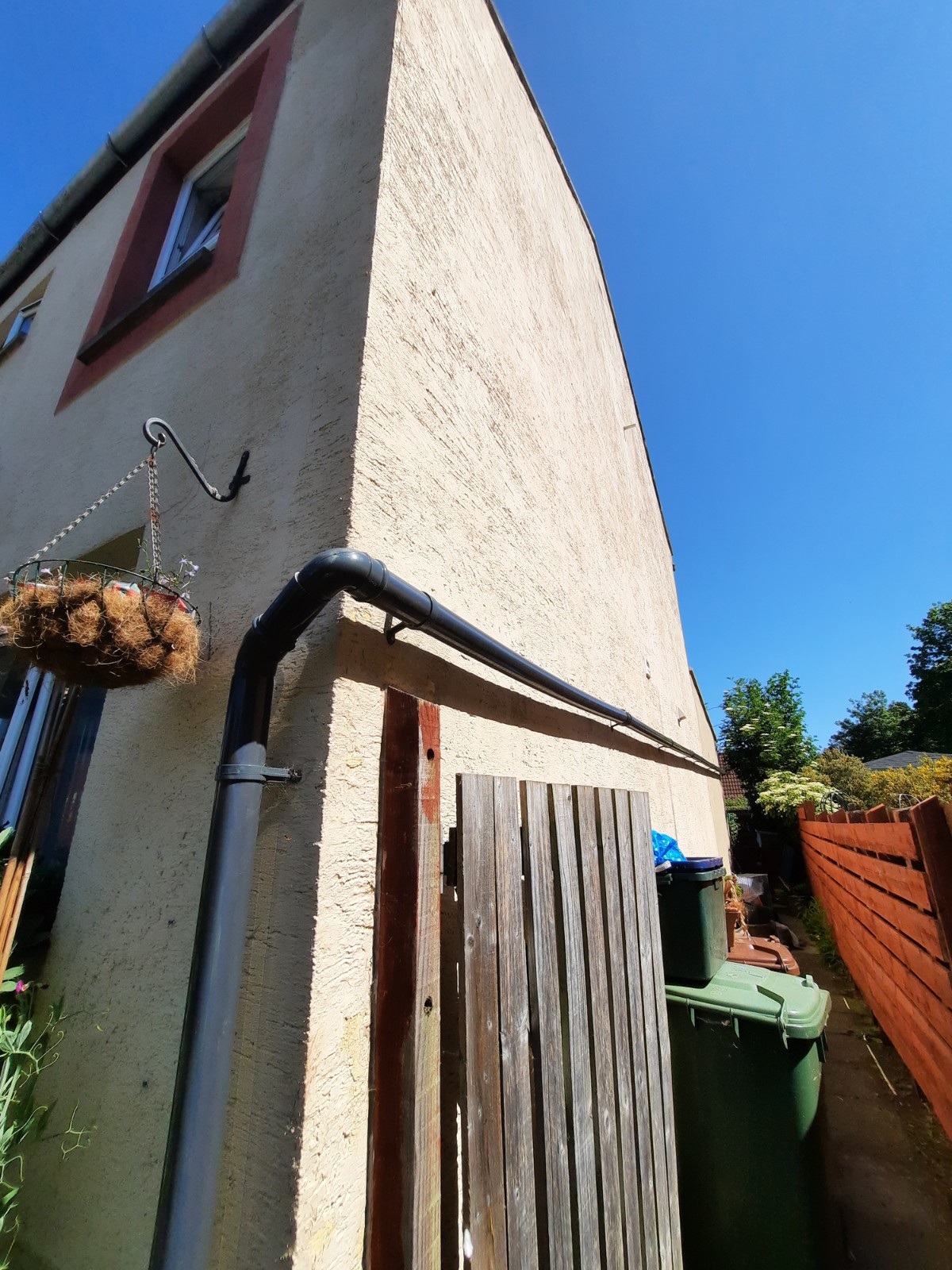 external wall insulation Edinburgh installation on rear wall beside garden