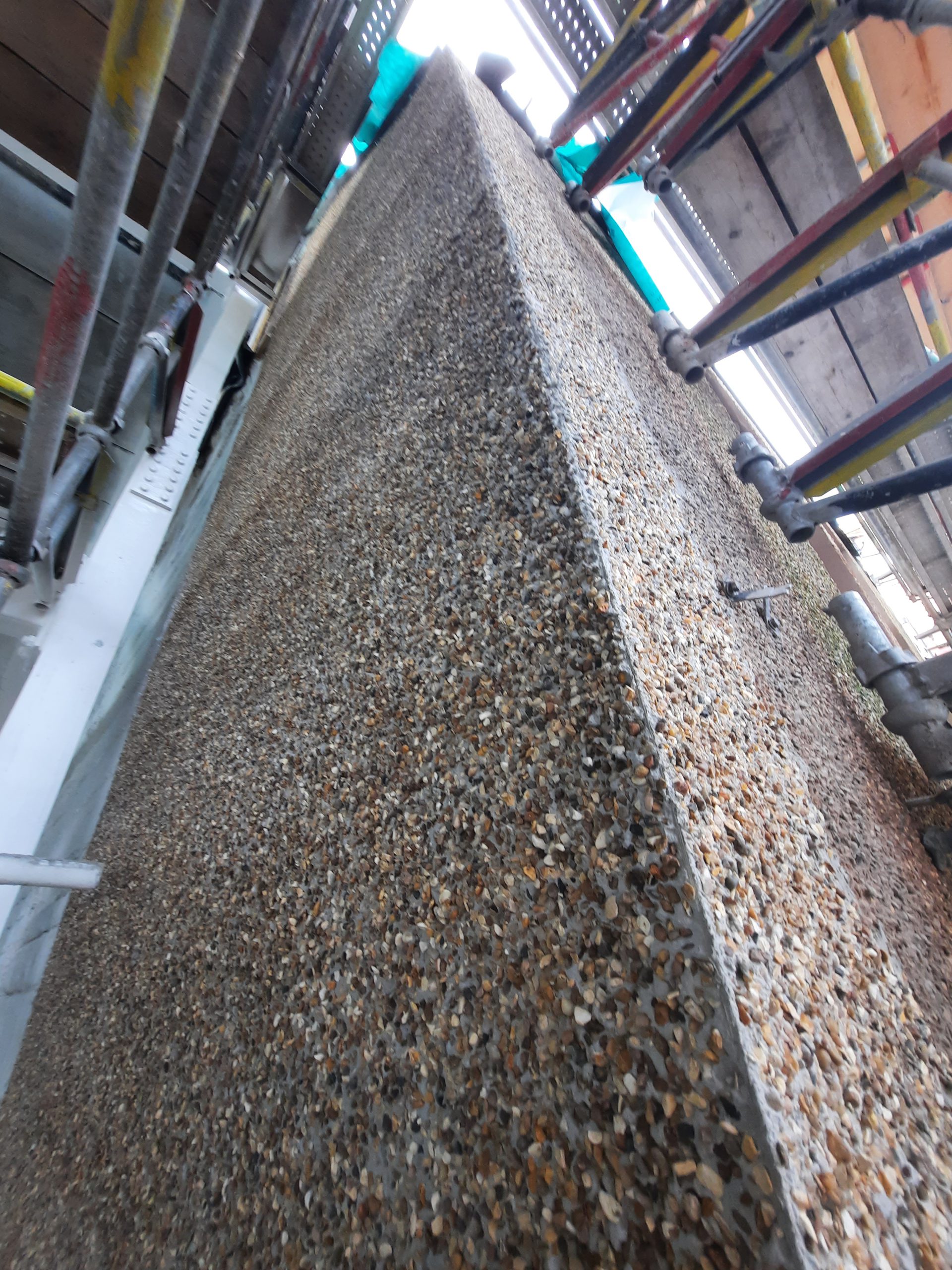 Insulation Edinburgh on wall with new insulation panels under scaffold