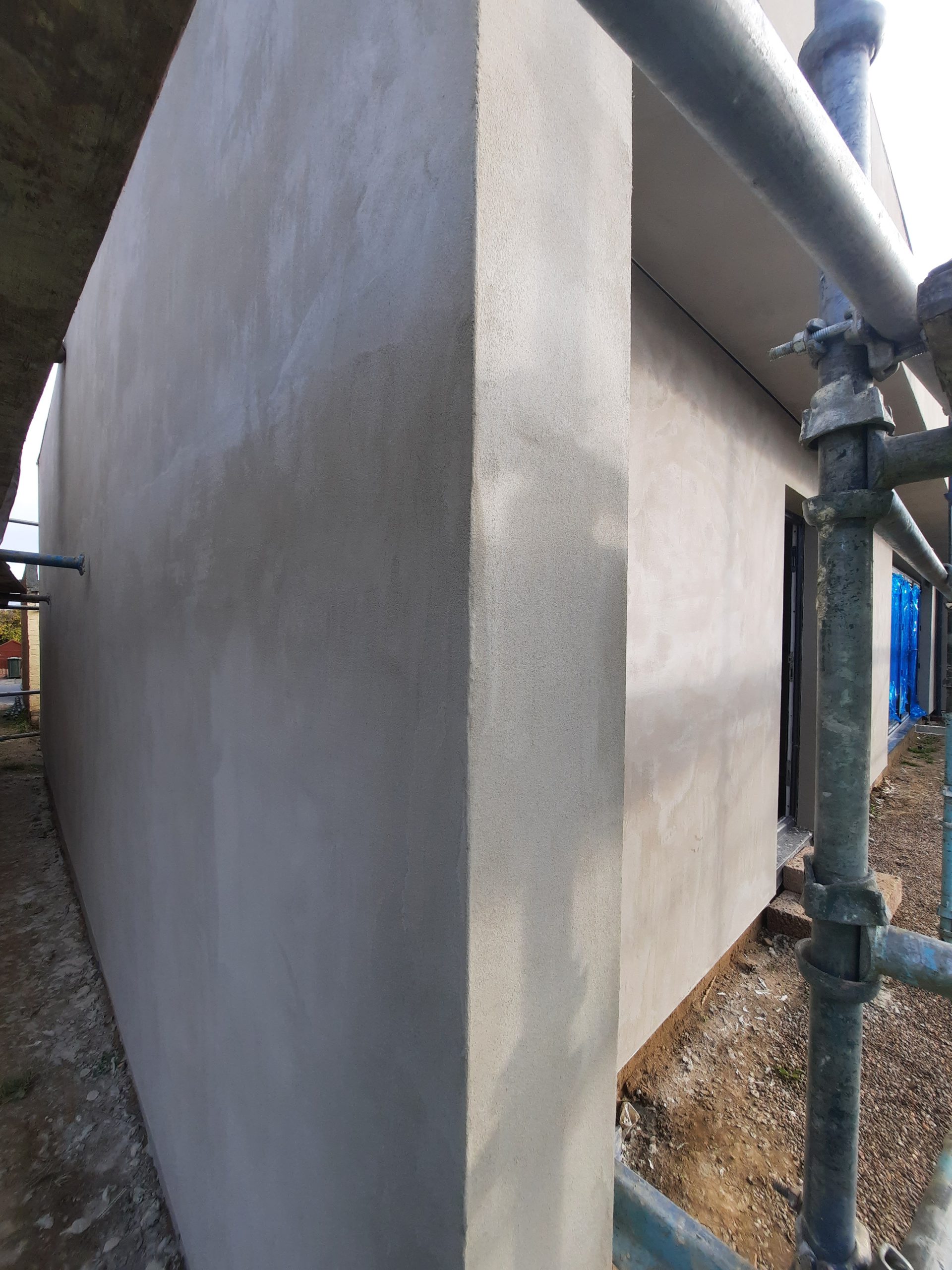 external wall insulation Edinburgh on modern flat-roof house