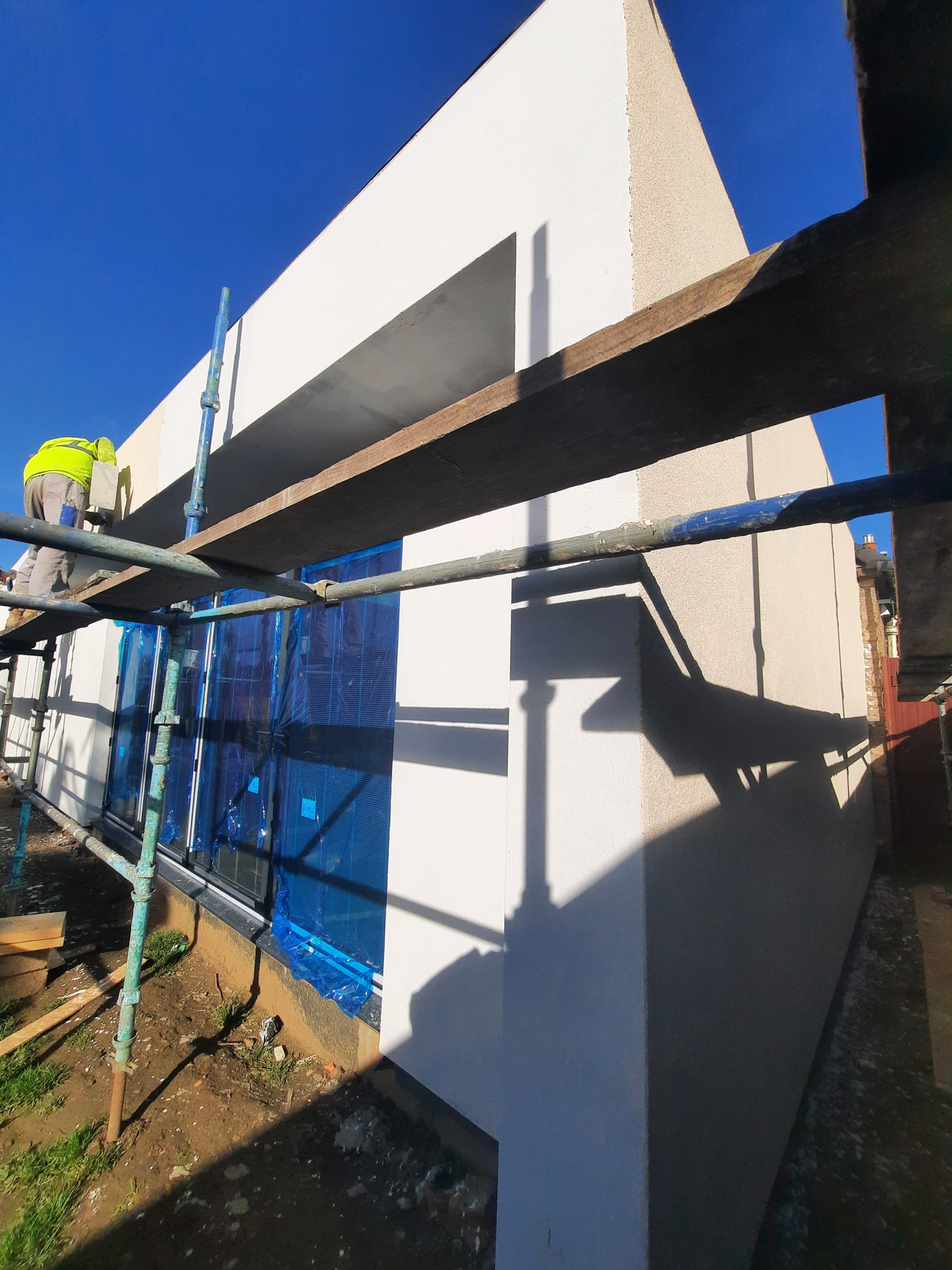 house rendering Edinburgh during frontage coating application
