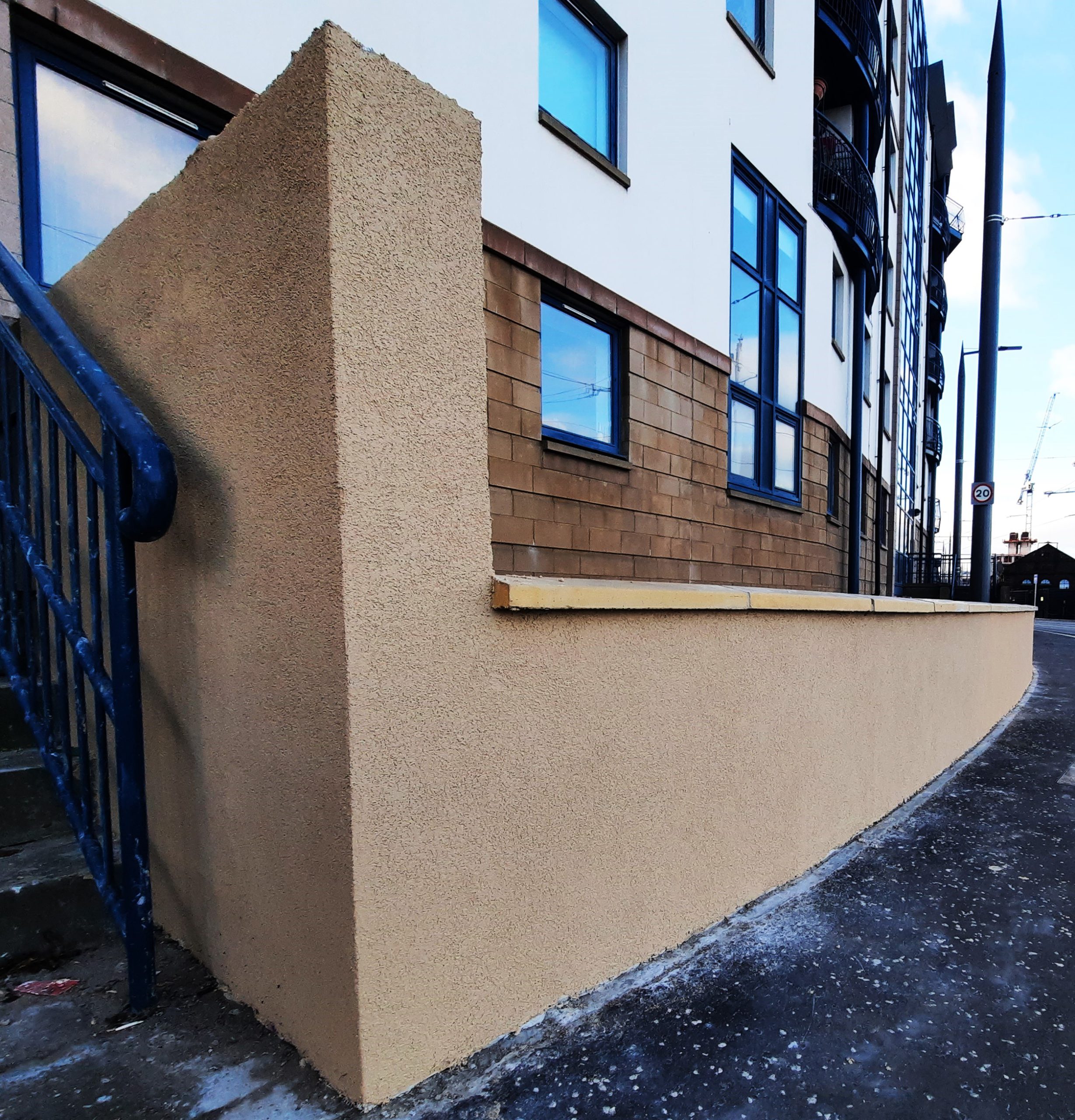 external wall insulation Edinburgh on tall section beside staircase