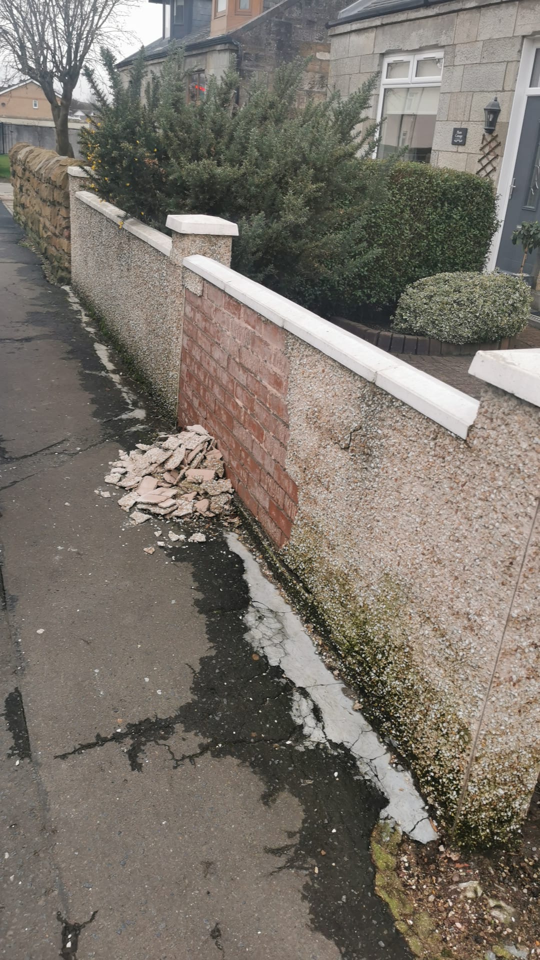 roughcasting Edinburgh on damaged boundary wall with debris