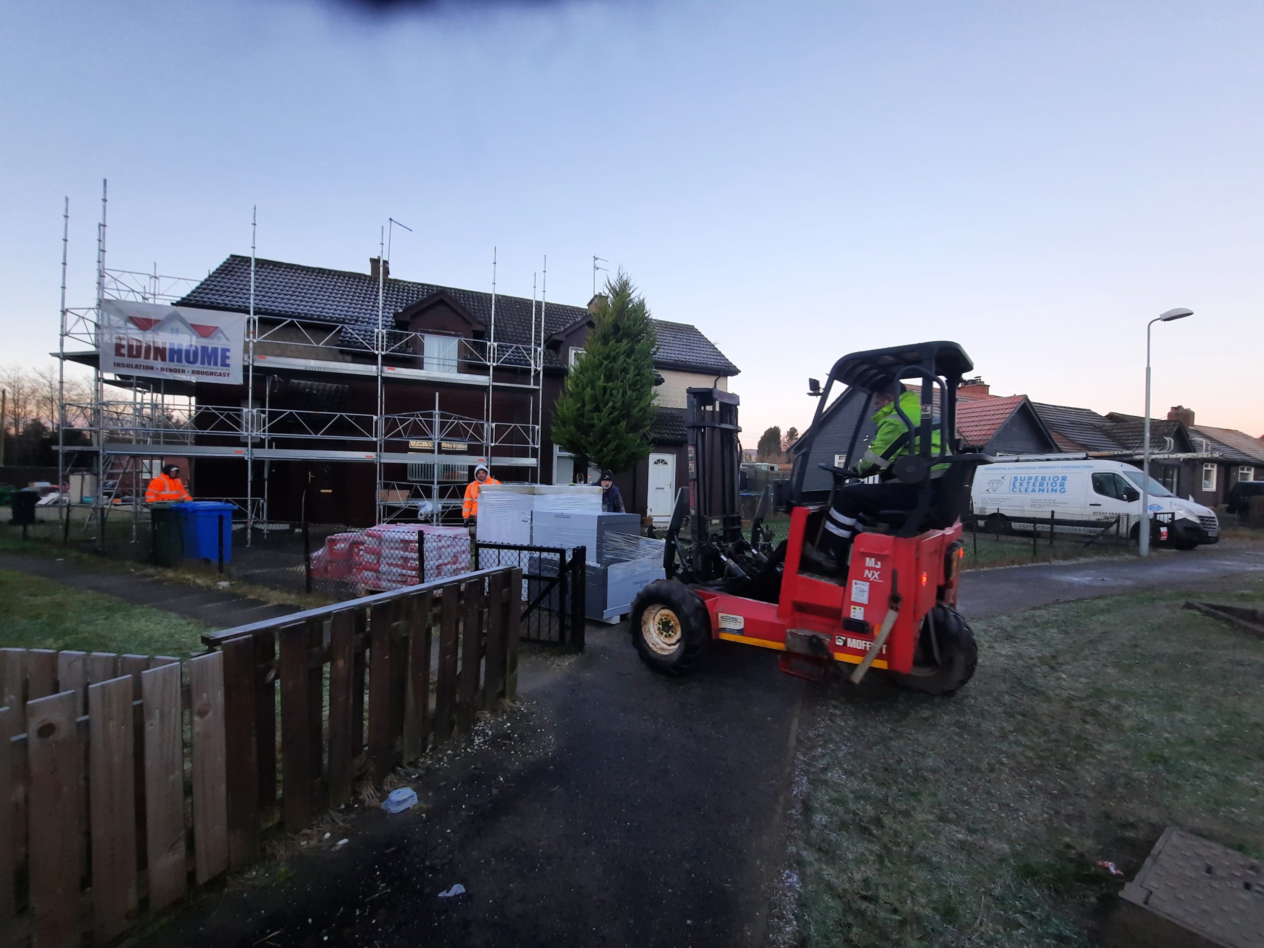 roughcasting Edinburgh materials being delivered to site
