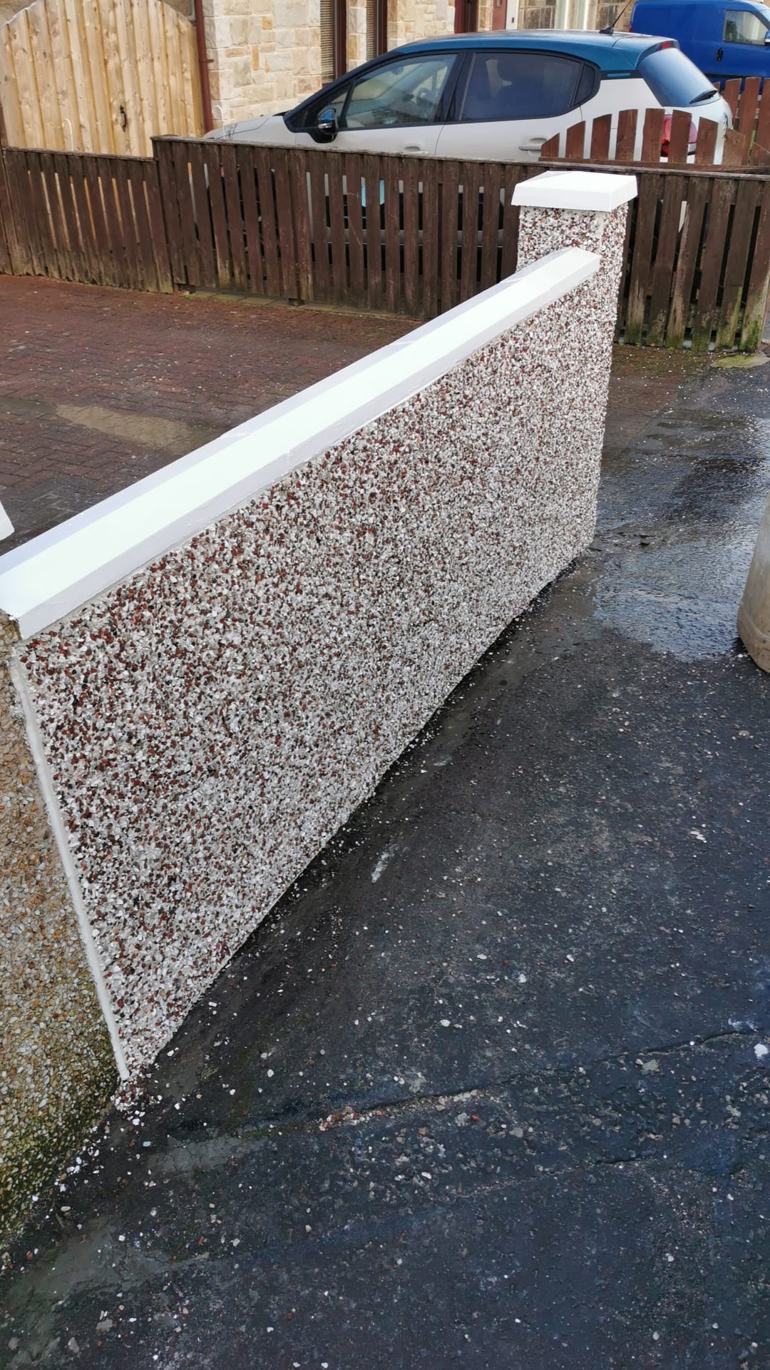 Insulation Edinburgh behind pebbledash boundary wall finish