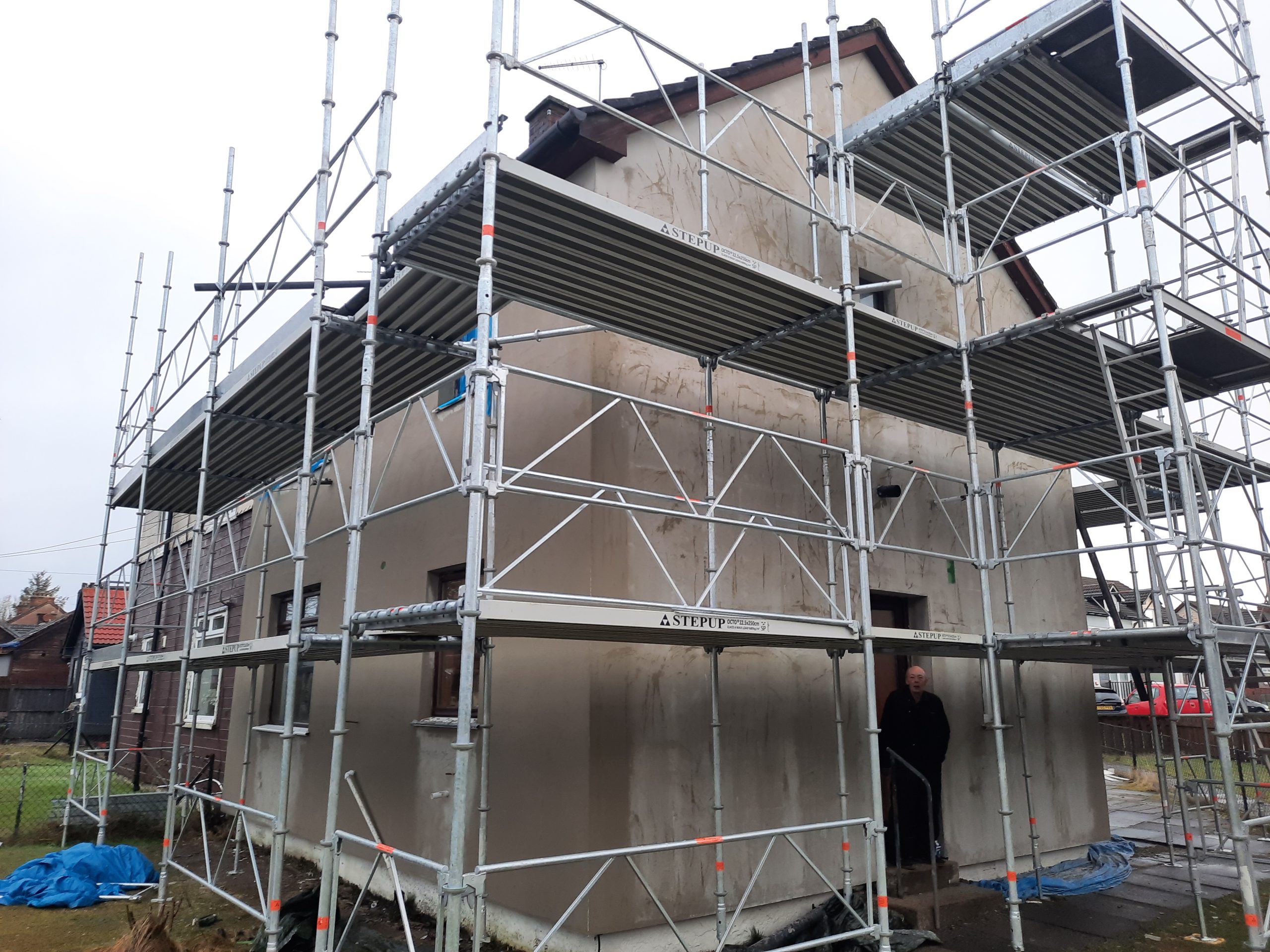 Insulation Edinburgh applied behind scaffolding on extension wall