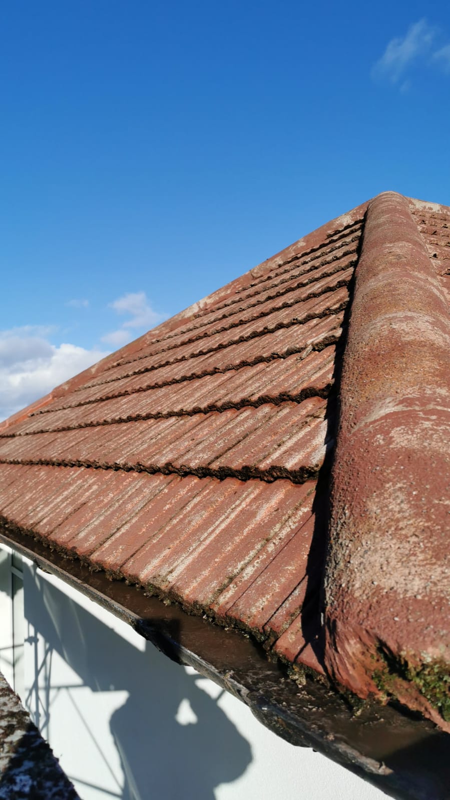 Insulation Edinburgh beneath cleaned red tile roof