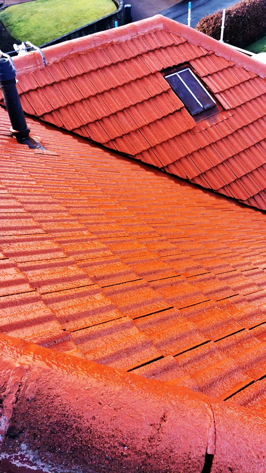 roughcast render repair at roof section with visible water run-off